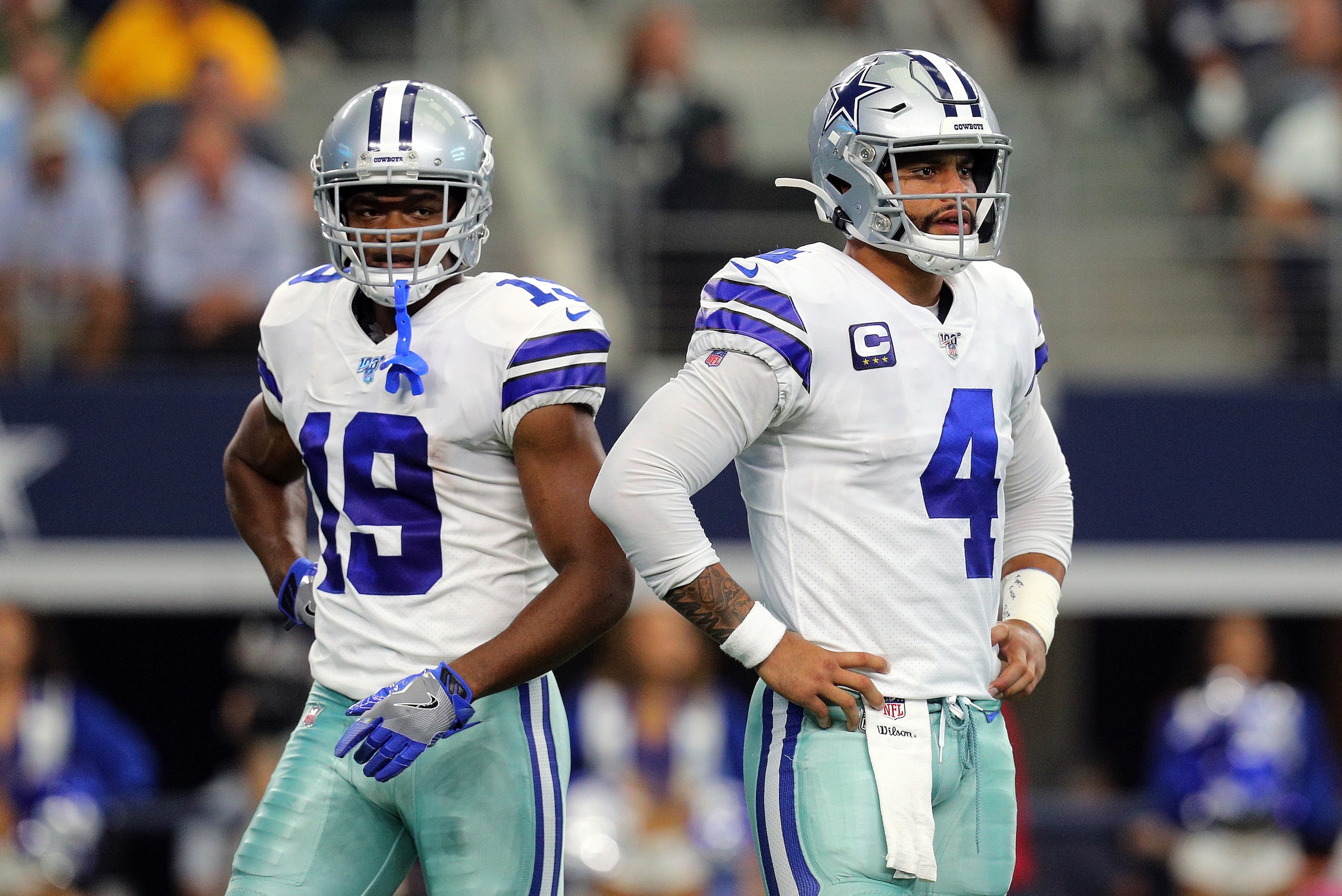 ARLINGTON, TEXAS - OCTOBER 06: Amari Cooper #19 and Dak Prescott #4 of the Dallas Cowboys stand on the field in the first quarter against the Green Bay Packers at AT&T Stadium on October 06, 2019 in Arlington, Texas. (Photo by Richard Rodriguez/Getty Imag ARLINGTON, TEXAS - OCTOBER 06: Amari Cooper #19 and Dak Prescott #4 of the Dallas Cowboys stand on the field in the first quarter against the Green Bay Packers at AT&T Stadium on October 06, 2019 in Arlington, Texas. (Photo by Richard Rodriguez/Getty Imag