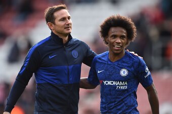 Chelsea's English head coach Frank Lampard (L) and Chelsea's Brazilian midfielder Willian celebrate on the pitch after the English Premier League football match between Southampton and Chelsea at St Mary's Stadium in Southampton, southern England on Octob