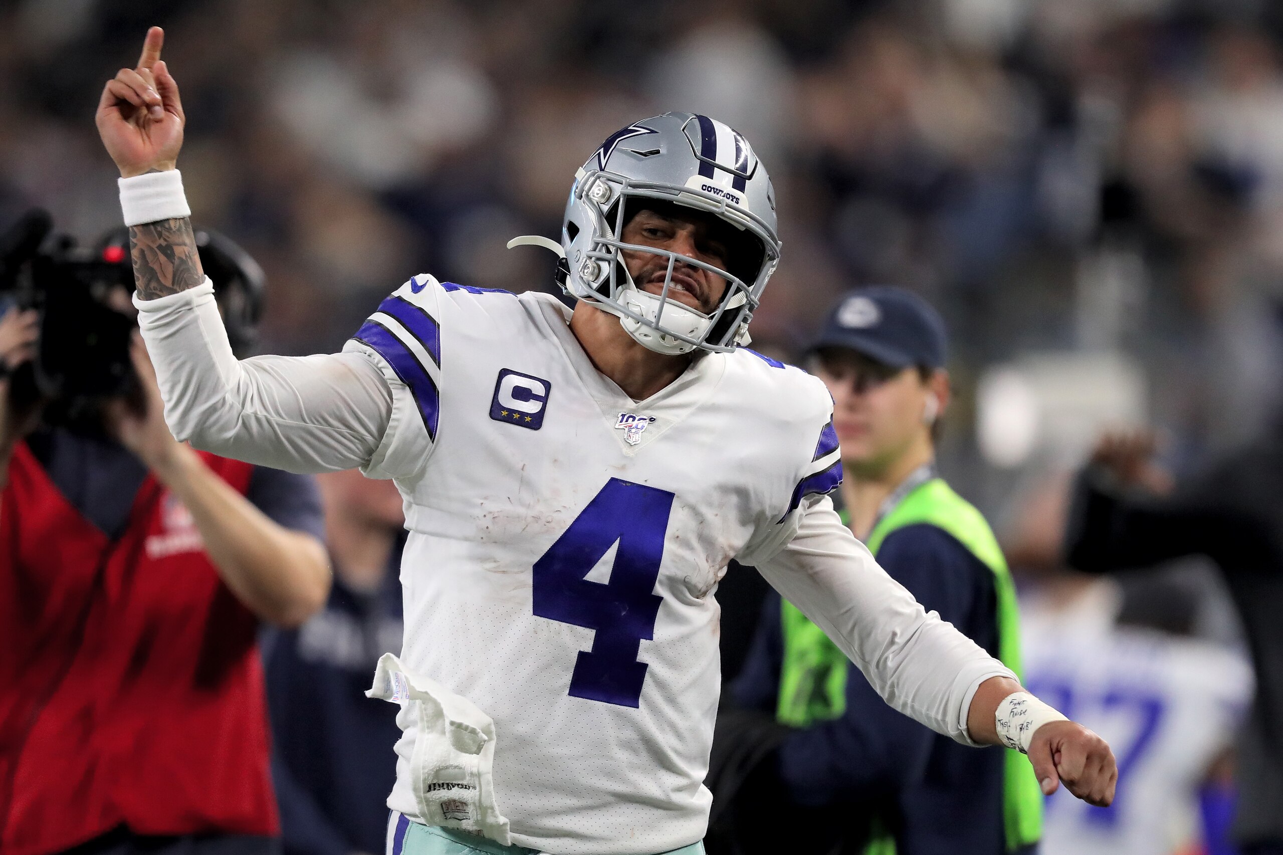 ARLINGTON, TEXAS - DECEMBER 29: Dak Prescott #4 of the Dallas Cowboys reacts in the third quarter against the Washington Redskins in the game at AT&T Stadium on December 29, 2019 in Arlington, Texas. (Photo by Tom Pennington/Getty Images) ARLINGTON, TEXAS - DECEMBER 29: Dak Prescott #4 of the Dallas Cowboys reacts in the third quarter against the Washington Redskins in the game at AT&T Stadium on December 29, 2019 in Arlington, Texas. (Photo by Tom Pennington/Getty Images)