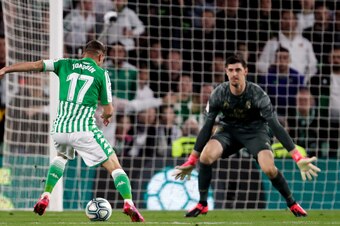 SEVILLA, SPAIN - MARCH 8: (L-R) Joaquin of Real Betis Sevilla, Courtois of Real Madrid  during the La Liga Santander  match between Real Betis Sevilla v Real Madrid at the Estadio Benito Villamarin on March 8, 2020 in Sevilla Spain (Photo by Eric Verhoeve