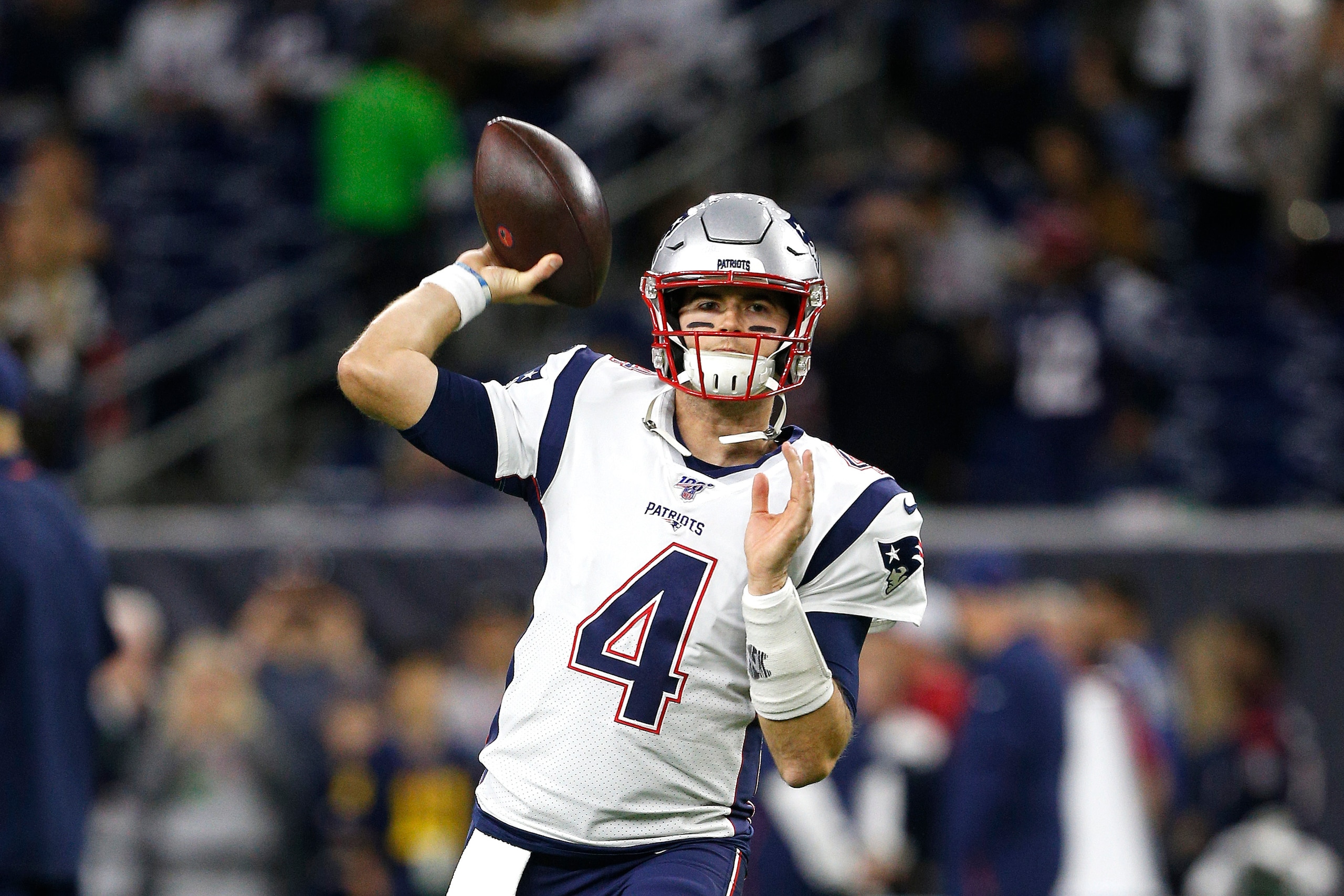 HOUSTON, TEXAS - DECEMBER 01: Jarrett Stidham #4 of the New England Patriots warms up prior to the game against the Houston Texans at NRG Stadium on December 01, 2019 in Houston, Texas. (Photo by Bob Levey/Getty Images) HOUSTON, TEXAS - DECEMBER 01: Jarrett Stidham #4 of the New England Patriots warms up prior to the game against the Houston Texans at NRG Stadium on December 01, 2019 in Houston, Texas. (Photo by Bob Levey/Getty Images)