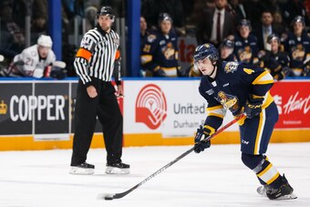 OSHAWA, ON - NOVEMBER 22: Jamie Drysdale #4 of the Erie Otters skates with the puck during an OHL game against the Oshawa Generals at the Tribute Communities Centre on November 22, 2019 in Oshawa, Ontario, Canada.  (Photo by Chris Tanouye/Getty Images)