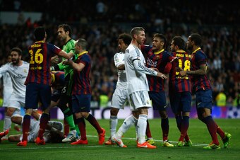 MADRID, SPAIN - MARCH 23: Barcelona and Real Madrid players including Sergio Ramos of Real Madrid and Neymar of Barcelona exchange words during the La Liga match between Real Madrid CF and FC Barcelona at the Bernabeu on March 23, 2014 in Madrid, Spain.  