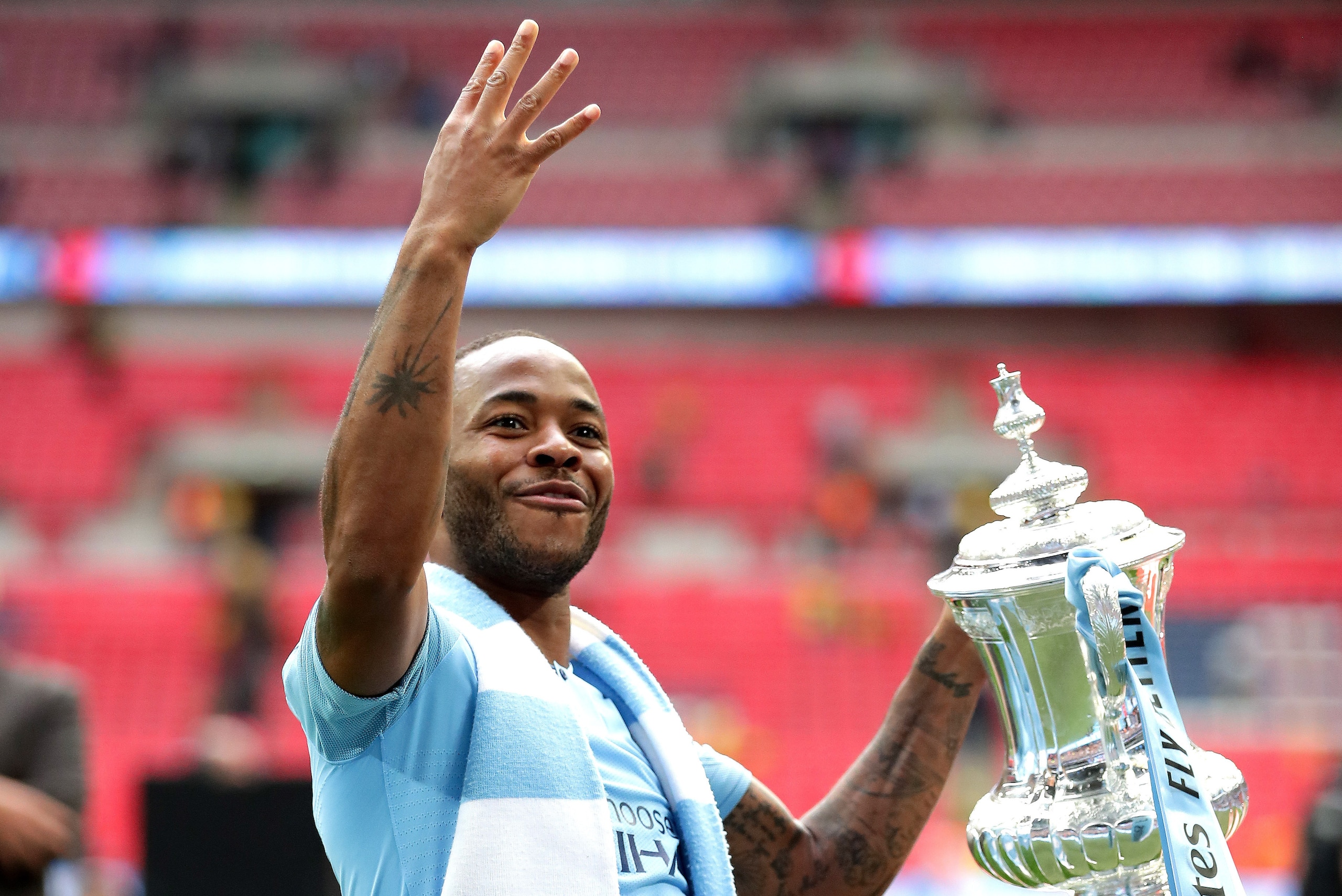LONDON, ENGLAND - MAY 18:  Raheem Sterling of Manchester City celebrates following his team's victory in the the FA Cup Final match between Manchester City and Watford at Wembley Stadium on May 18, 2019 in London, England. (Photo by Richard Heathcote/Gett
