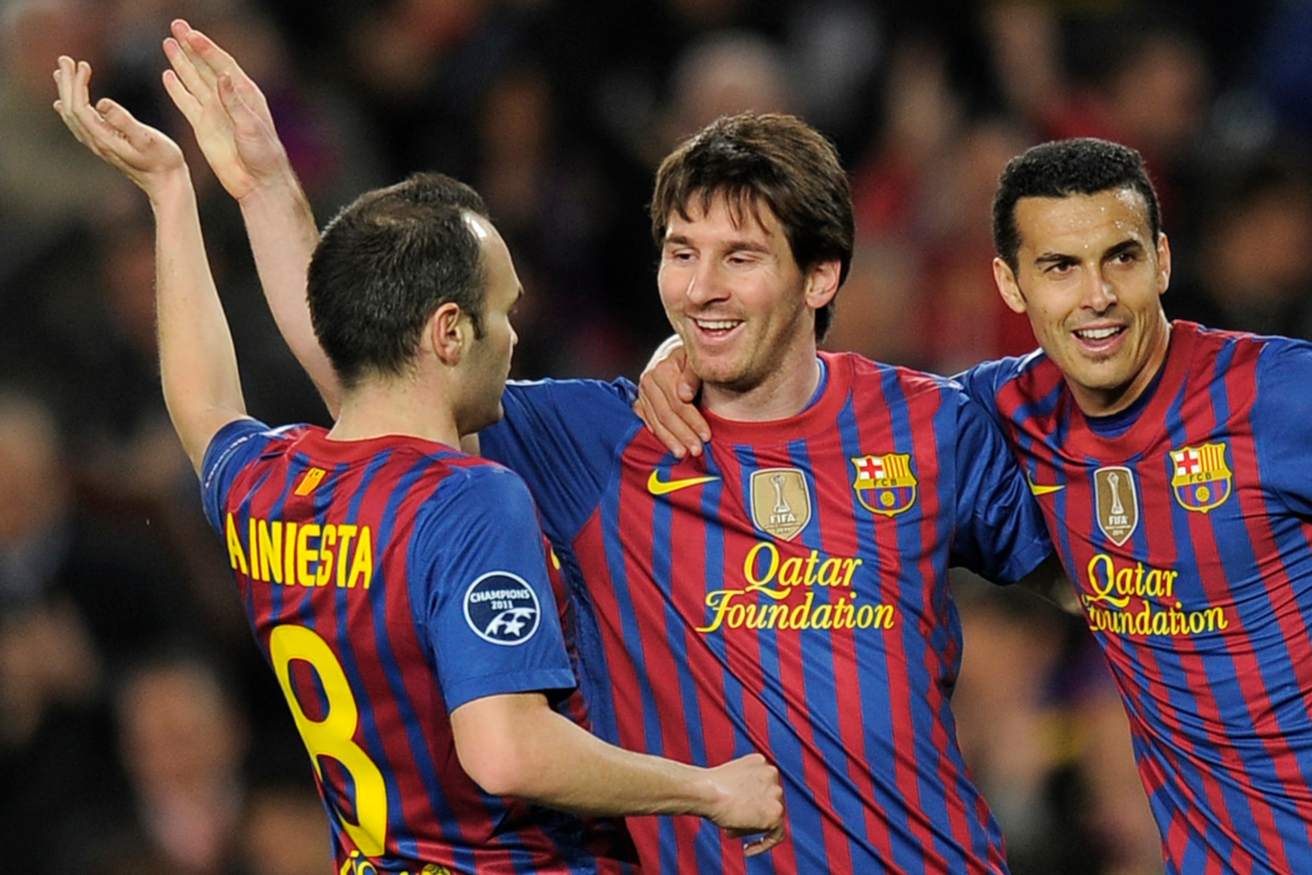 FC Barcelona's Argentinian forward Lionel Messi (C), Barcelona's midfielder Andres Iniesta (L) and Barcelona's forward Pedro Rodriguez (R) celebrate after scoring a goal during the UEFA Champions League football match, round of 16 second leg, FC Barcelona