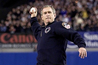 US President George W. Bush throws out the ceremonial