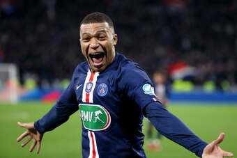 LYON, FRANCE - MARCH 4: Kylian Mbappe of PSG celebrates his third goal during the French Cup semifinal match between Olympique Lyonnais (OL) and Paris Saint-Germain (PSG) at Groupama Stadium on March 4, 2020 in Decines near Lyon, France. (Photo by Jean Ca