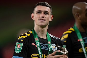 LONDON, ENGLAND - MARCH 01: Phil Foden of Manchester City celebrates victory after the Carabao Cup Final between Aston Villa and Manchester City at Wembley Stadium on March 01, 2020 in London, England. (Photo by Visionhaus)