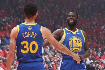 TORONTO, CANADA - JUNE 10: Stephen Curry #30 and Draymond Green #23 of the Golden State Warriors shake hands during Game Five of the NBA Finals on June 10, 2019 at Scotiabank Arena in Toronto, Ontario, Canada. NOTE TO USER: User expressly acknowledges and