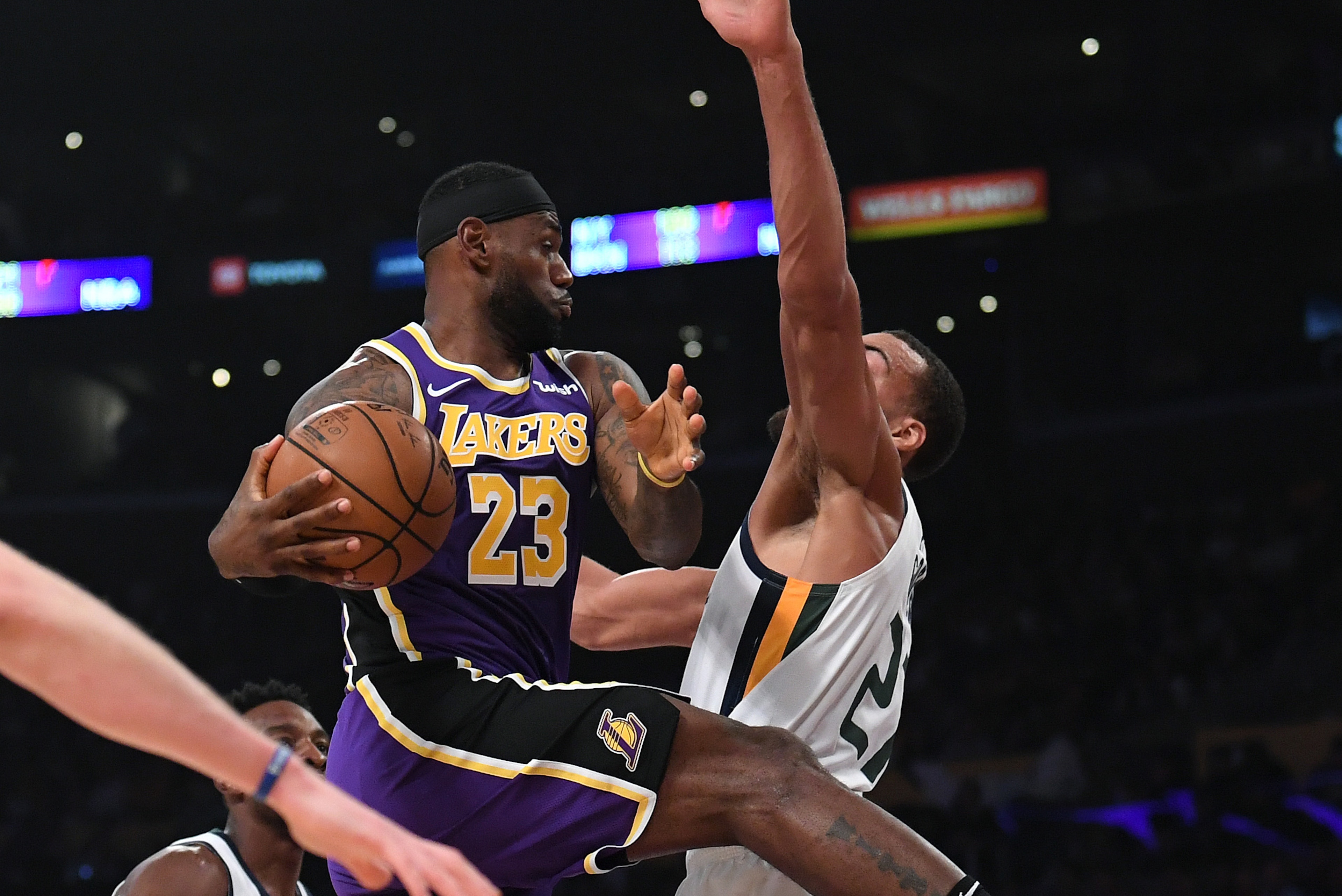 LOS ANGELES, CALIFORNIA - OCTOBER 25:  LeBron James #23 of the Los Angeles Lakers makes a pass around Rudy Gobert #27 of the Utah Jazz during the first half at Staples Center on October 25, 2019 in Los Angeles, California. (Photo by Harry How/Getty Images
