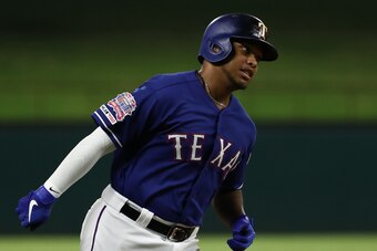 ARLINGTON, TEXAS - JULY 31:  Willie Calhoun #5 of the Texas Rangers runs after hitting a three-run homerun against the Seattle Mariners in the fifth inning at Globe Life Park in Arlington on July 31, 2019 in Arlington, Texas. (Photo by Ronald Martinez/Get