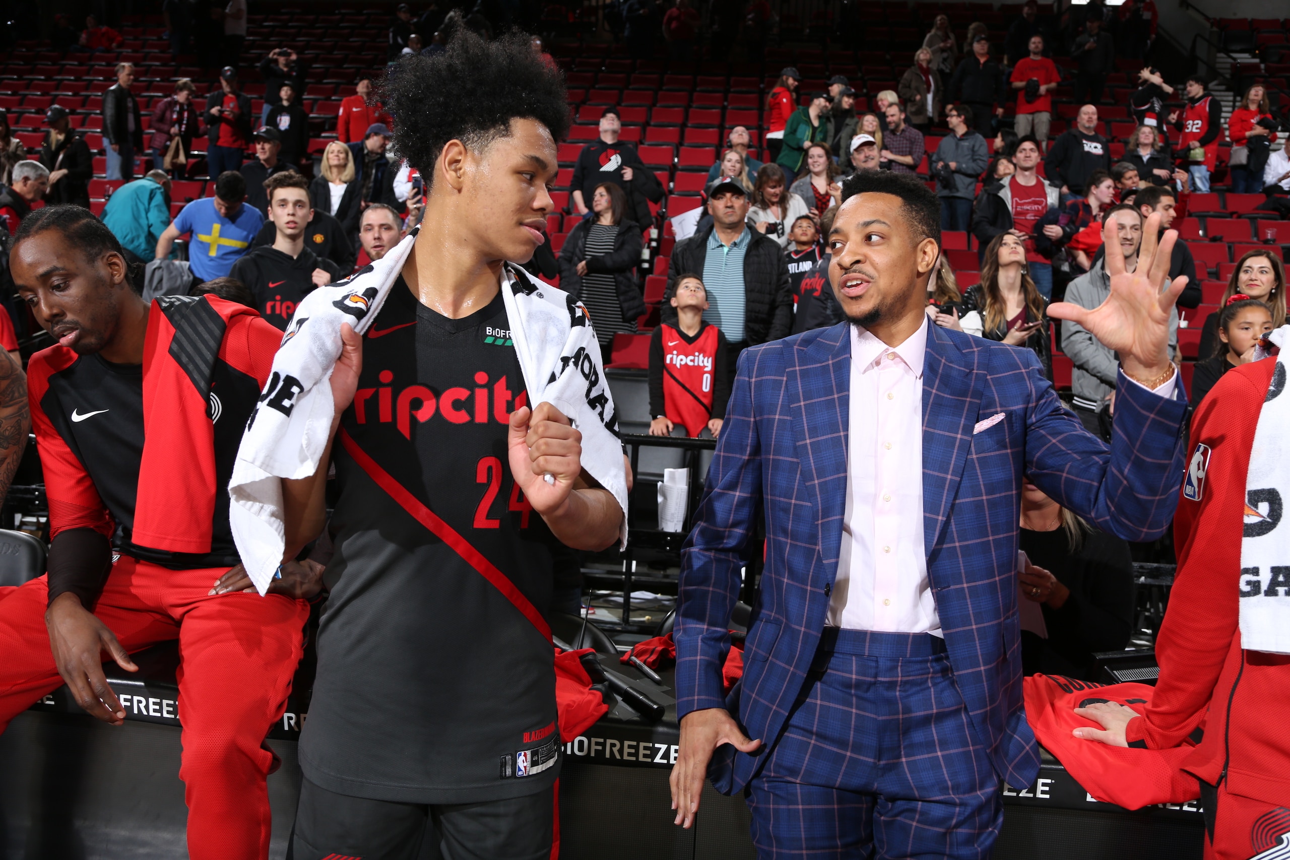 PORTLAND, OR - APRIL 10: Anfernee Simons #24 and CJ McCollum #3 of the Portland Trail Blazers talk after a game against the Sacramento Kings on April 10, 2019 at the Moda Center Arena in Portland, Oregon. NOTE TO USER: User expressly acknowledges and agre