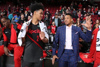 PORTLAND, OR - APRIL 10: Anfernee Simons #24 and CJ McCollum #3 of the Portland Trail Blazers talk after a game against the Sacramento Kings on April 10, 2019 at the Moda Center Arena in Portland, Oregon. NOTE TO USER: User expressly acknowledges and agre PORTLAND, OR - APRIL 10: Anfernee Simons #24 and CJ McCollum #3 of the Portland Trail Blazers talk after a game against the Sacramento Kings on April 10, 2019 at the Moda Center Arena in Portland, Oregon. NOTE TO USER: User expressly acknowledges and agre