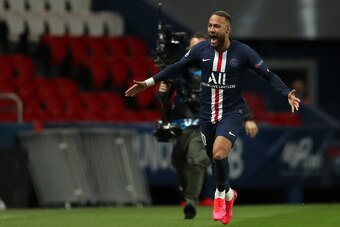 PARIS, FRANCE - MARCH 11: (FREE FOR EDITORIAL USE) In this handout image provided by UEFA, Neymar of Paris Saint-Germain celebrates after scoring his team's first goal during the UEFA Champions League round of 16 second leg match between Paris Saint-Germa