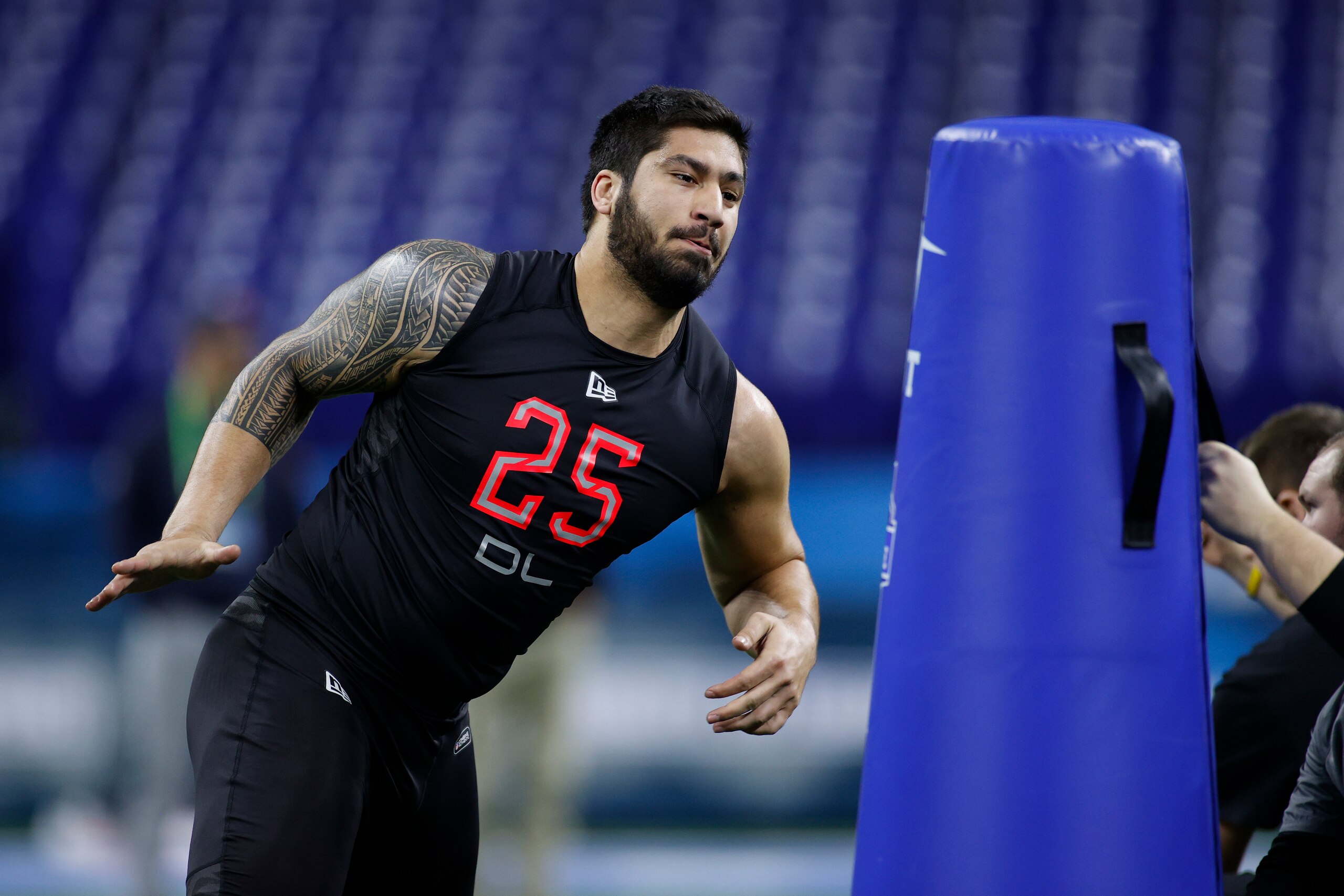 INDIANAPOLIS, IN - FEBRUARY 29: Defensive lineman A.J. Epenesa of Iowa runs a drill during the NFL Combine at Lucas Oil Stadium on February 29, 2020 in Indianapolis, Indiana. (Photo by Joe Robbins/Getty Images)