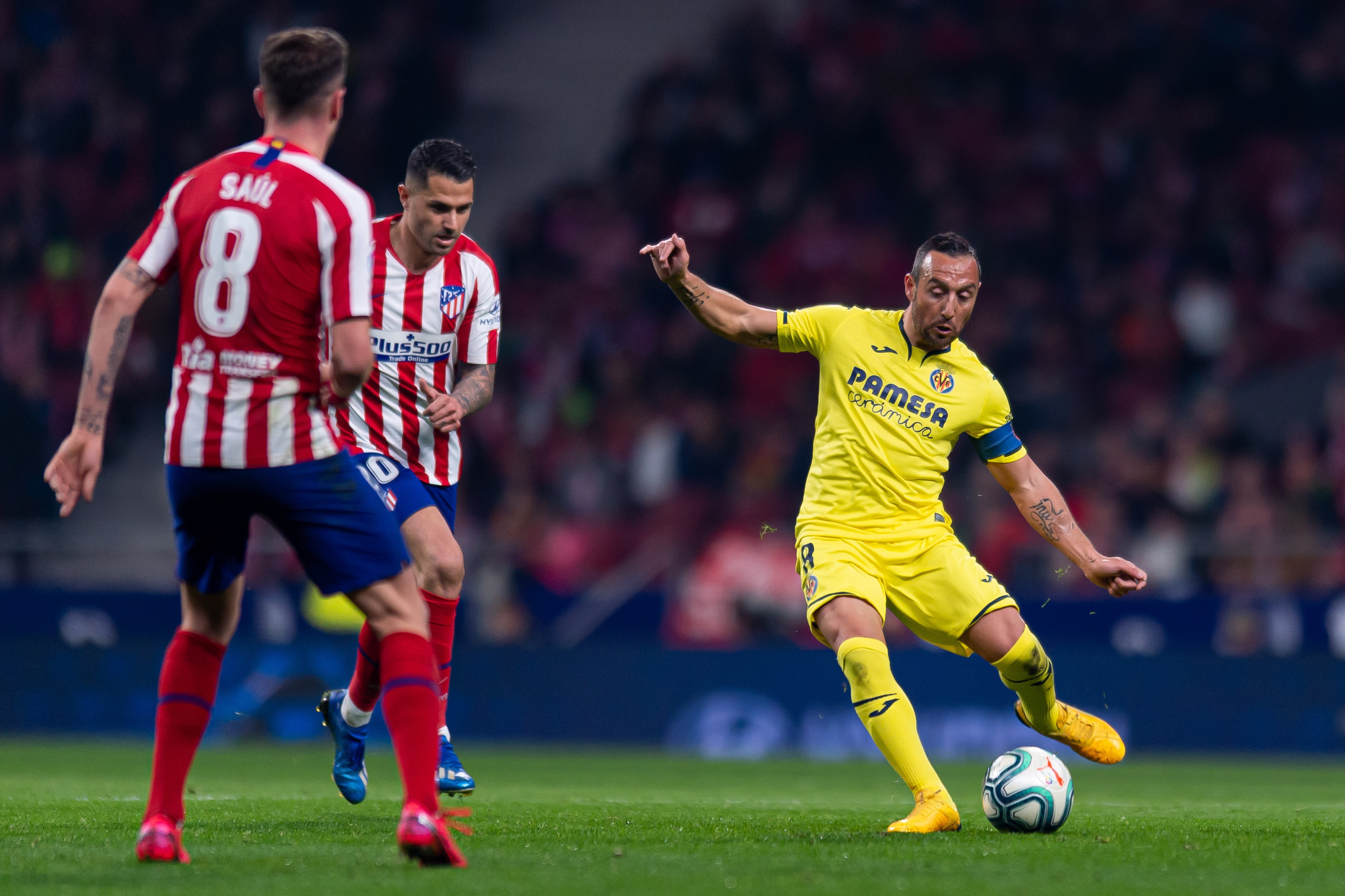 MADRID, SPAIN - FEBRUARY 23: (BILD ZEITUNG OUT) Vitolo of Atletico de Madrid and Santi Cazorla of Villarreal CF battle for the ball during the Liga match between Club Atletico de Madrid and Villarreal CF at Wanda Metropolitano on February 23, 2020 in Mad MADRID, SPAIN - FEBRUARY 23: (BILD ZEITUNG OUT) Vitolo of Atletico de Madrid and Santi Cazorla of Villarreal CF battle for the ball during the Liga match between Club Atletico de Madrid and Villarreal CF at Wanda Metropolitano on February 23, 2020 in Mad