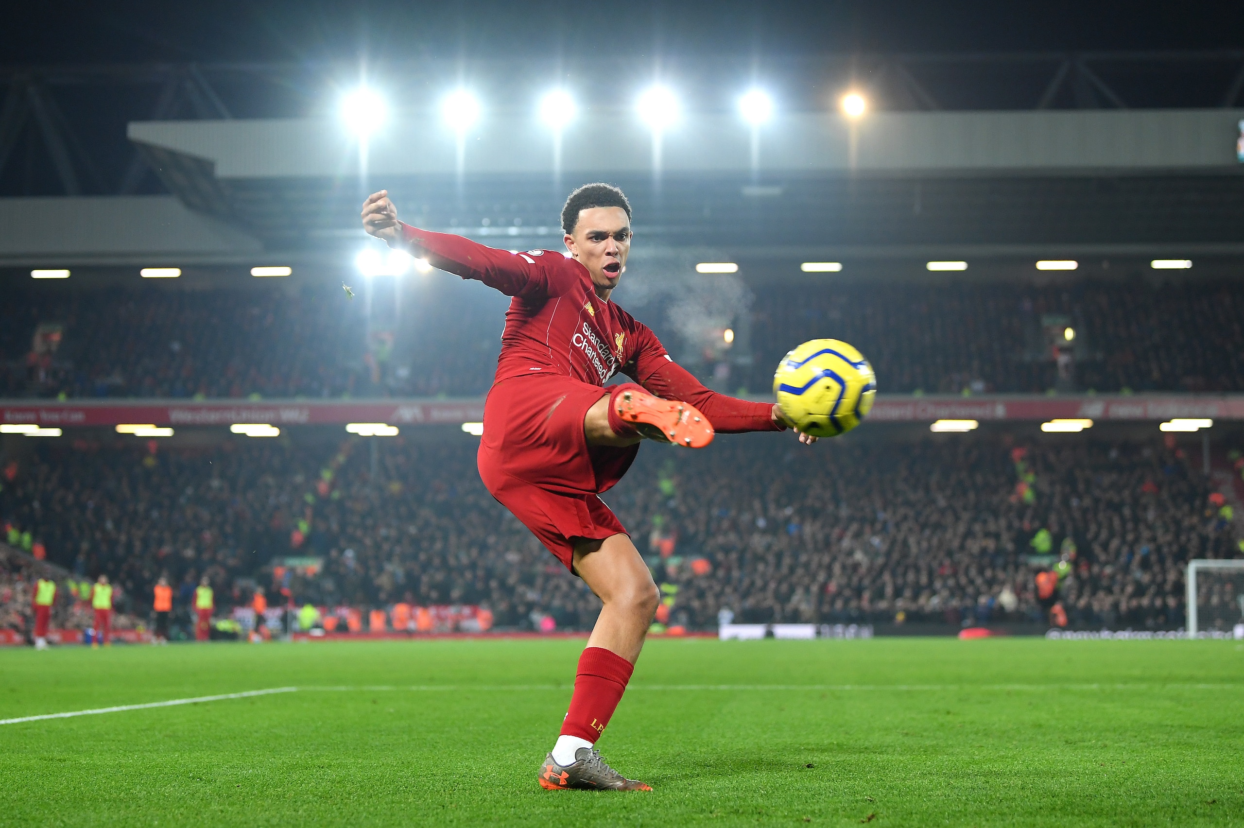 LIVERPOOL, ENGLAND - JANUARY 19: Trent Alexander-Arnold of Liverpool crosses the ball during the Premier League match between Liverpool FC and Manchester United at Anfield on January 19, 2020 in Liverpool, United Kingdom. (Photo by Michael Regan/Getty Ima