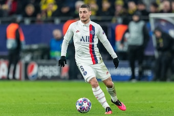 DORTMUND, GERMANY - FEBRUARY 18: Marco Verratti of Paris Saint-Germain runs with the ball during the UEFA Champions League round of 16 first leg match between Borussia Dortmund and Paris Saint-Germain at Signal Iduna Park on February 18, 2020 in Dortmund,