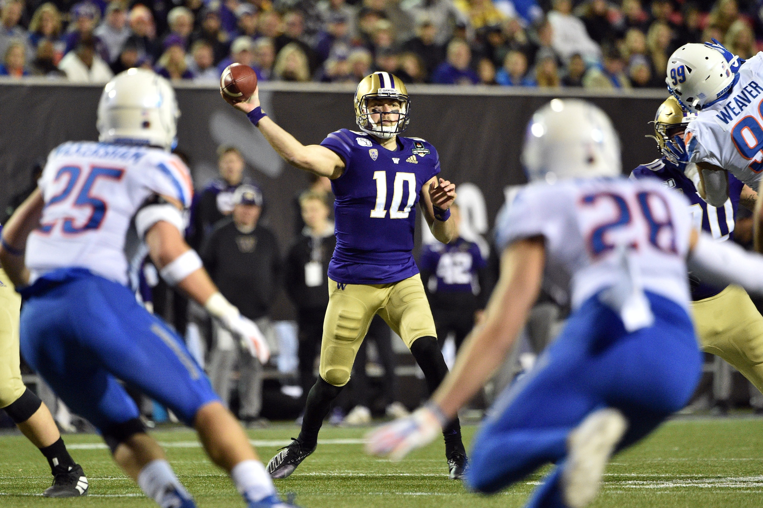 LAS VEGAS, NEVADA - DECEMBER 21: Quarterback Jacob Eason #10 of the Washington Huskies passes against the Boise State Broncos during the Mitsubishi Motors Las Vegas Bowl at Sam Boyd Stadium on December 21, 2019 in Las Vegas, Nevada.  (Photo by David Becke