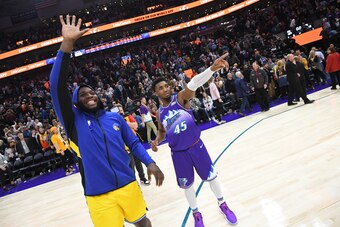 SALT LAKE CITY, UT - NOVEMBER 22: Donovan Mitchell #45 of the Utah Jazz and Eric Paschall #7 of the Golden State Warriors talk after the game on November 22, 2019 at vivint.SmartHome Arena in Salt Lake City, Utah. NOTE TO USER: User expressly acknowledges