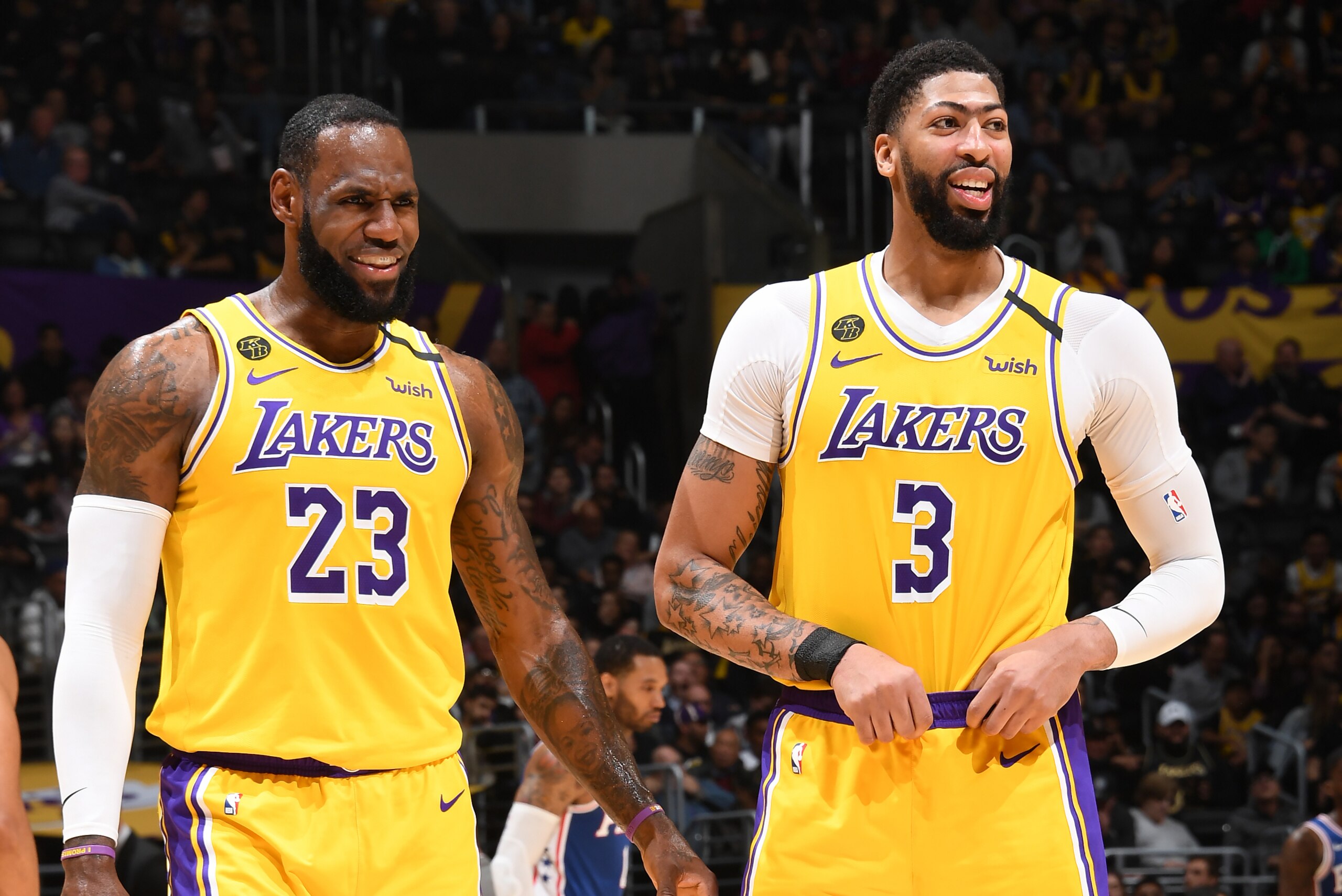 LOS ANGELES, CA - MARCH 3: LeBron James #23, and Anthony Davis #3 of the Los Angeles Lakers smile during the game against the Philadelphia 76ers on March 03, 2020 at STAPLES Center in Los Angeles, California. NOTE TO USER: User expressly acknowledges and 