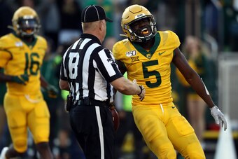 WACO, TEXAS - NOVEMBER 23:  Denzel Mims #5 of the Baylor Bears celebrates a touchdown pass reception against the Texas Longhorns in the second half at McLane Stadium on November 23, 2019 in Waco, Texas. (Photo by Ronald Martinez/Getty Images)