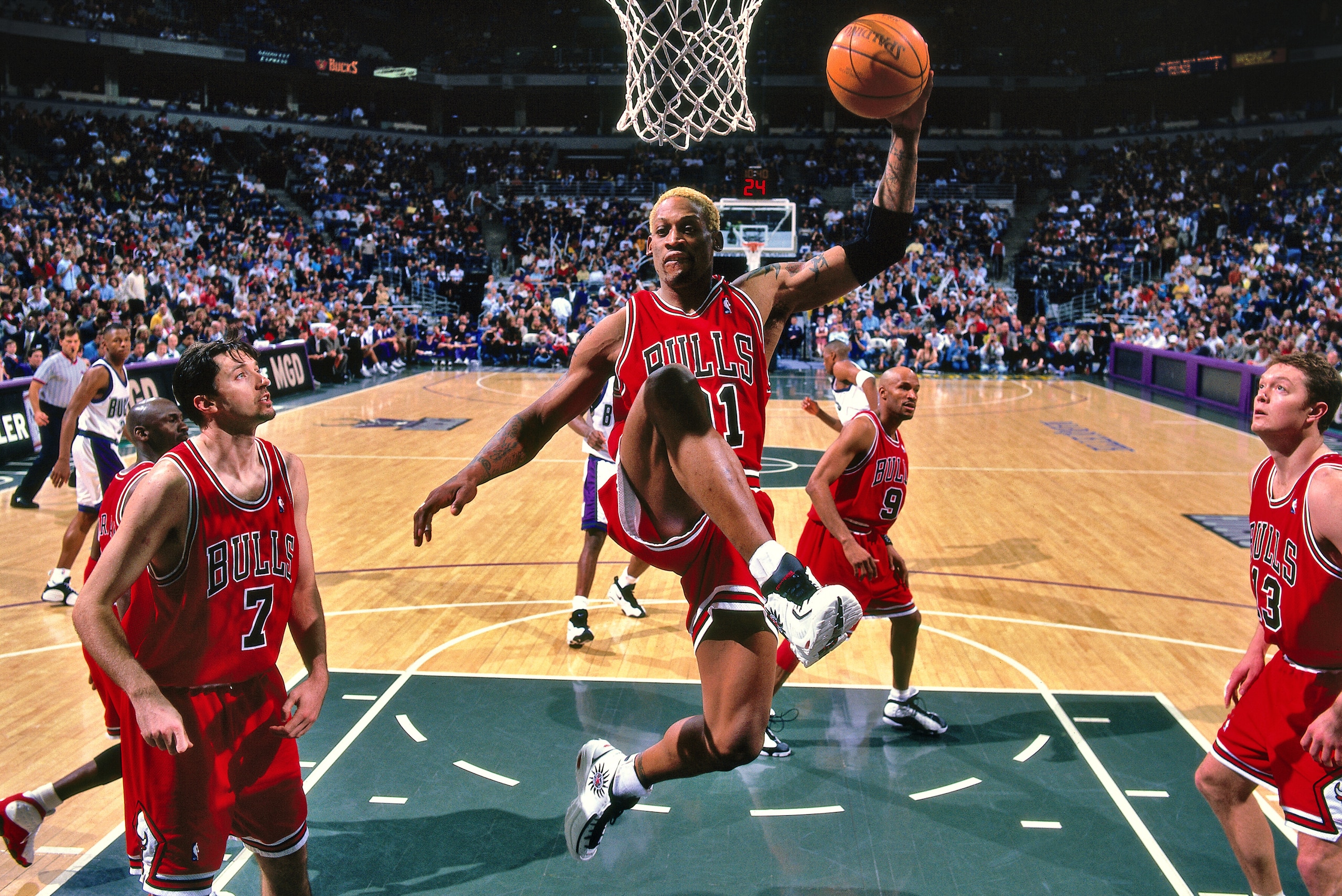MILWAUKEE, WI - MARCH 29: Dennis Rodman #91 of the Chicago Bulls recovers a rebound during the game against the Milwaukee Bucks on March 29, 1998 at the BMO Harris Bradley Center in Milwaukee, Wisconsin. NOTE TO USER: User expressly acknowledges and agree