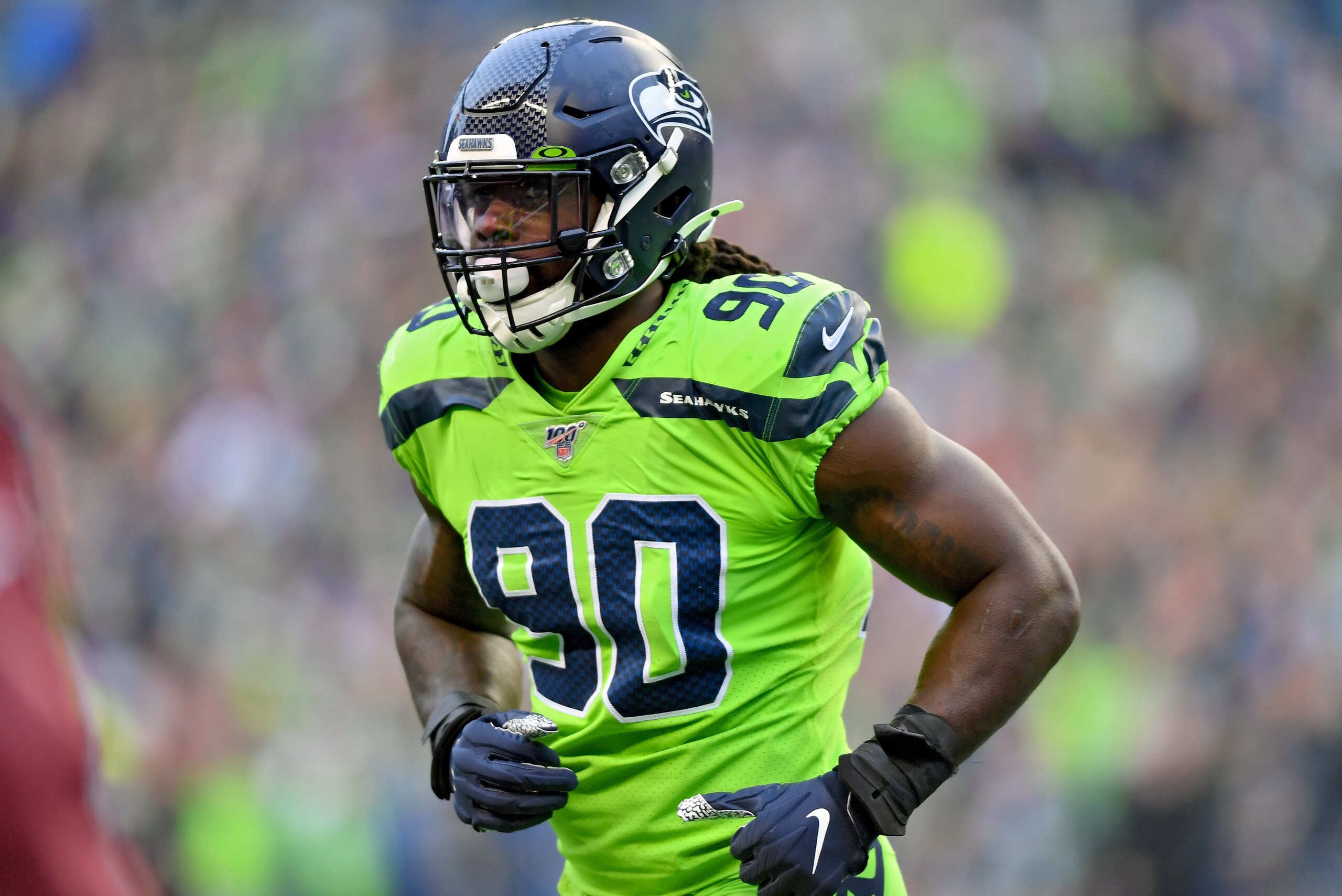 SEATTLE, WASHINGTON - OCTOBER 03: Jadeveon Clowney #90 of the Seattle Seahawks runs off the field during the game against the Los Angeles Rams at CenturyLink Field on October 03, 2019 in Seattle, Washington. The Seattle Seahawks top the Los Angeles Rams 3