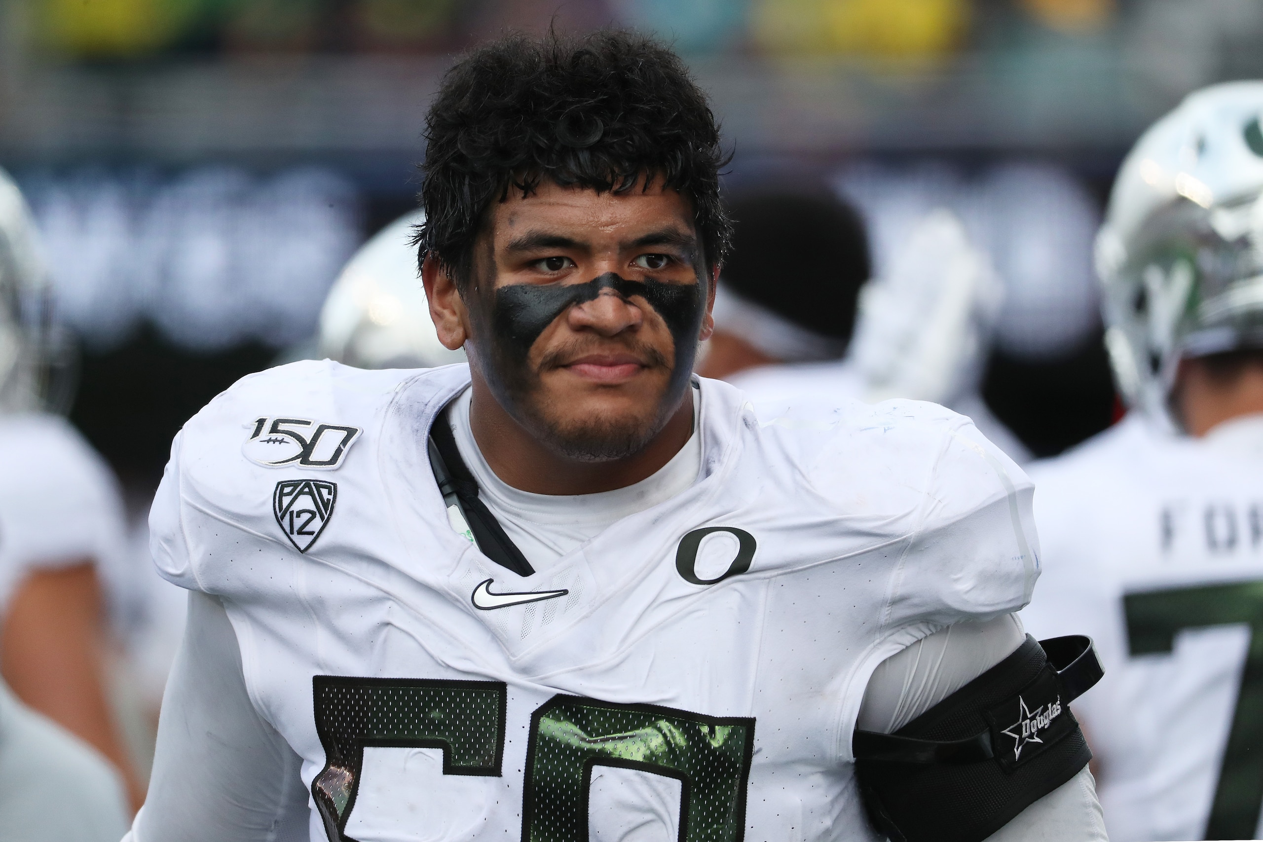 SEATTLE, WASHINGTON - OCTOBER 19: Penei Sewell #58 of the Oregon Ducks looks on in the fourth quarter against the Washington Huskies during their game at Husky Stadium on October 19, 2019 in Seattle, Washington. (Photo by Abbie Parr/Getty Images)