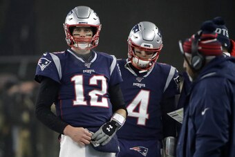The Patriots did not draft a potential replacement for Tom Brady. But Jarrett Stidham (right) should have some competition for the job.