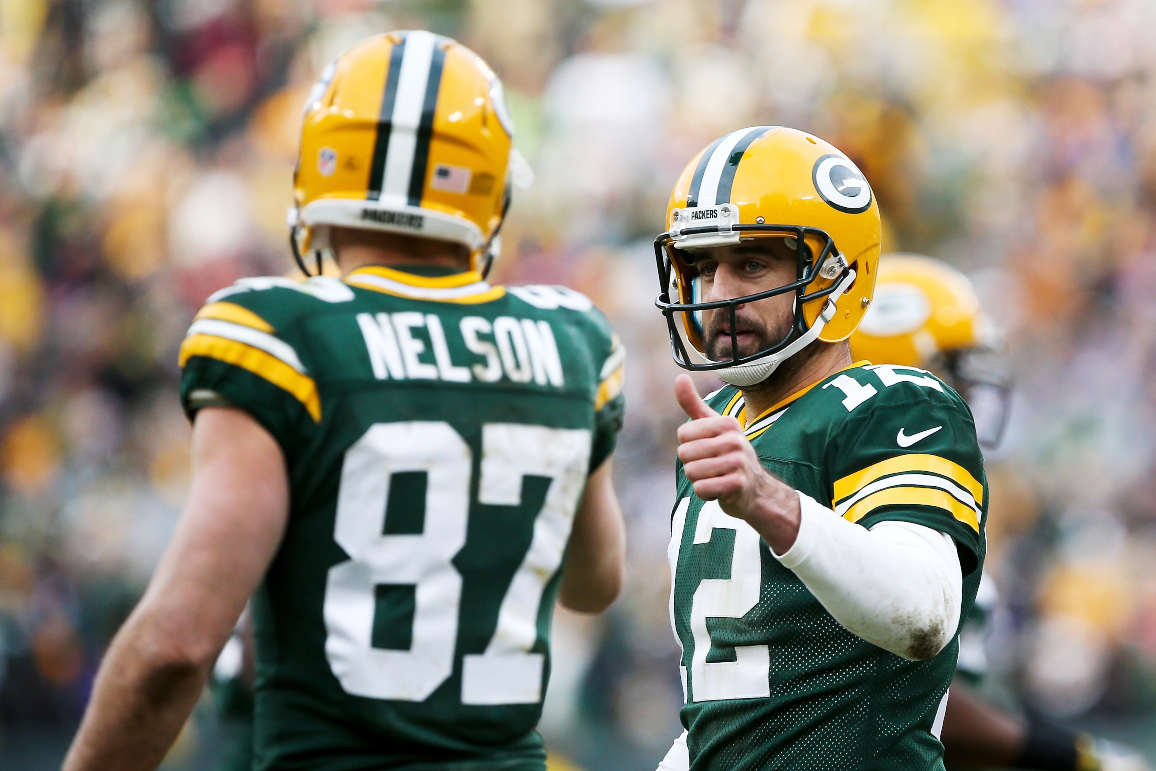 GREEN BAY, WI - DECEMBER 24:  Aaron Rodgers #12 and Jordy Nelson #87 of the Green Bay Packers celebrate after scoring a touchdown in the fourth quarter against the Minnesota Vikings at Lambeau Field on December 24, 2016 in Green Bay, Wisconsin. (Photo by 