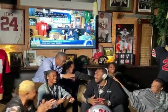 UNSPECIFIED LOCATION - APRIL 24: (EDITORIAL USE ONLY) In this still image from video provided by the NFL, Terrell Lewis, center, is congratulated being selected by the Los Angeles Rams during the third round of the 2020 NFL Draft on April 24, 2020. (Photo