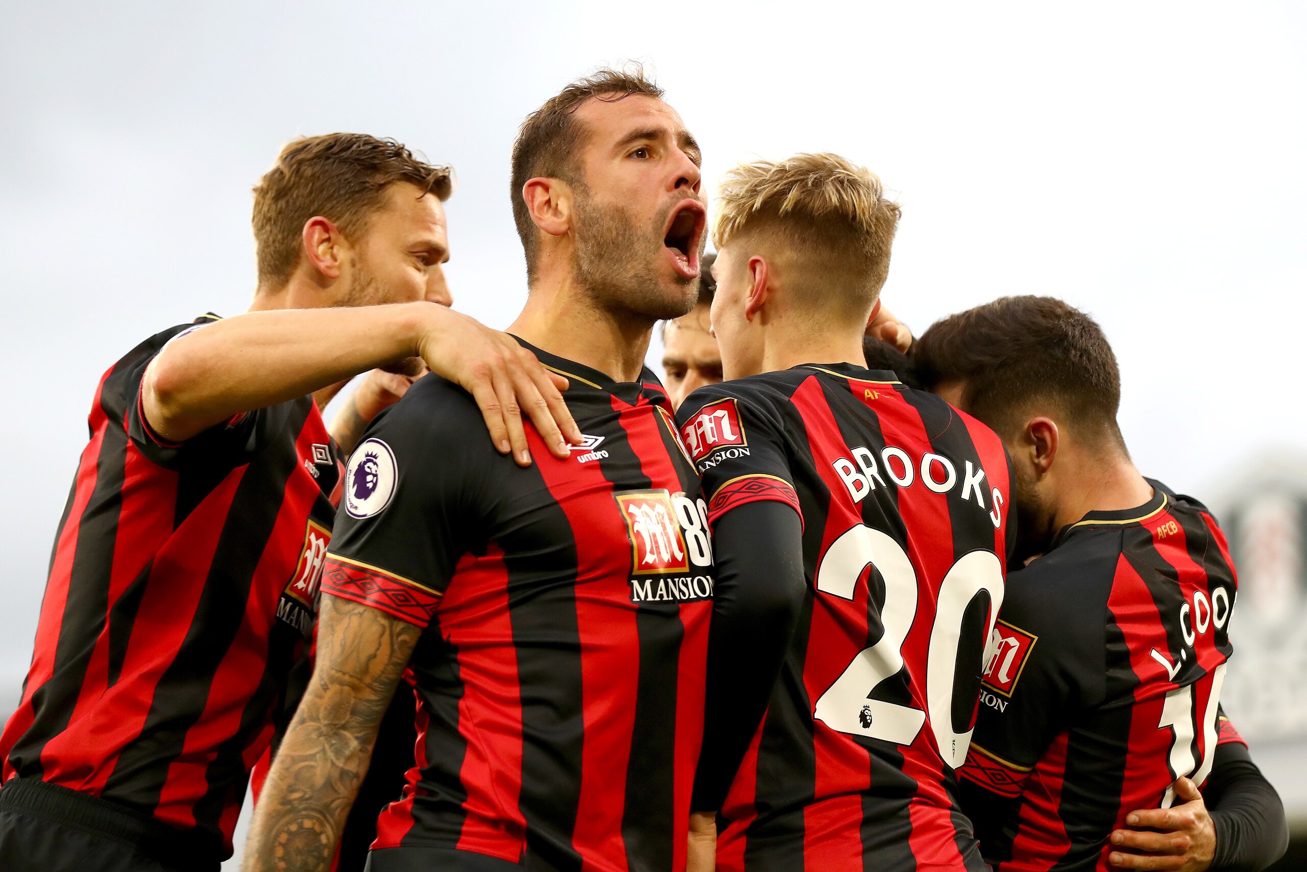 LONDON, ENGLAND - OCTOBER 27: David Brooks of AFC Bournemouth celebrates with teammates after scoring his team's second goal during the Premier League match between Fulham FC and AFC Bournemouth at Craven Cottage on October 27, 2018 in London, United Kin LONDON, ENGLAND - OCTOBER 27: David Brooks of AFC Bournemouth celebrates with teammates after scoring his team's second goal during the Premier League match between Fulham FC and AFC Bournemouth at Craven Cottage on October 27, 2018 in London, United Kin