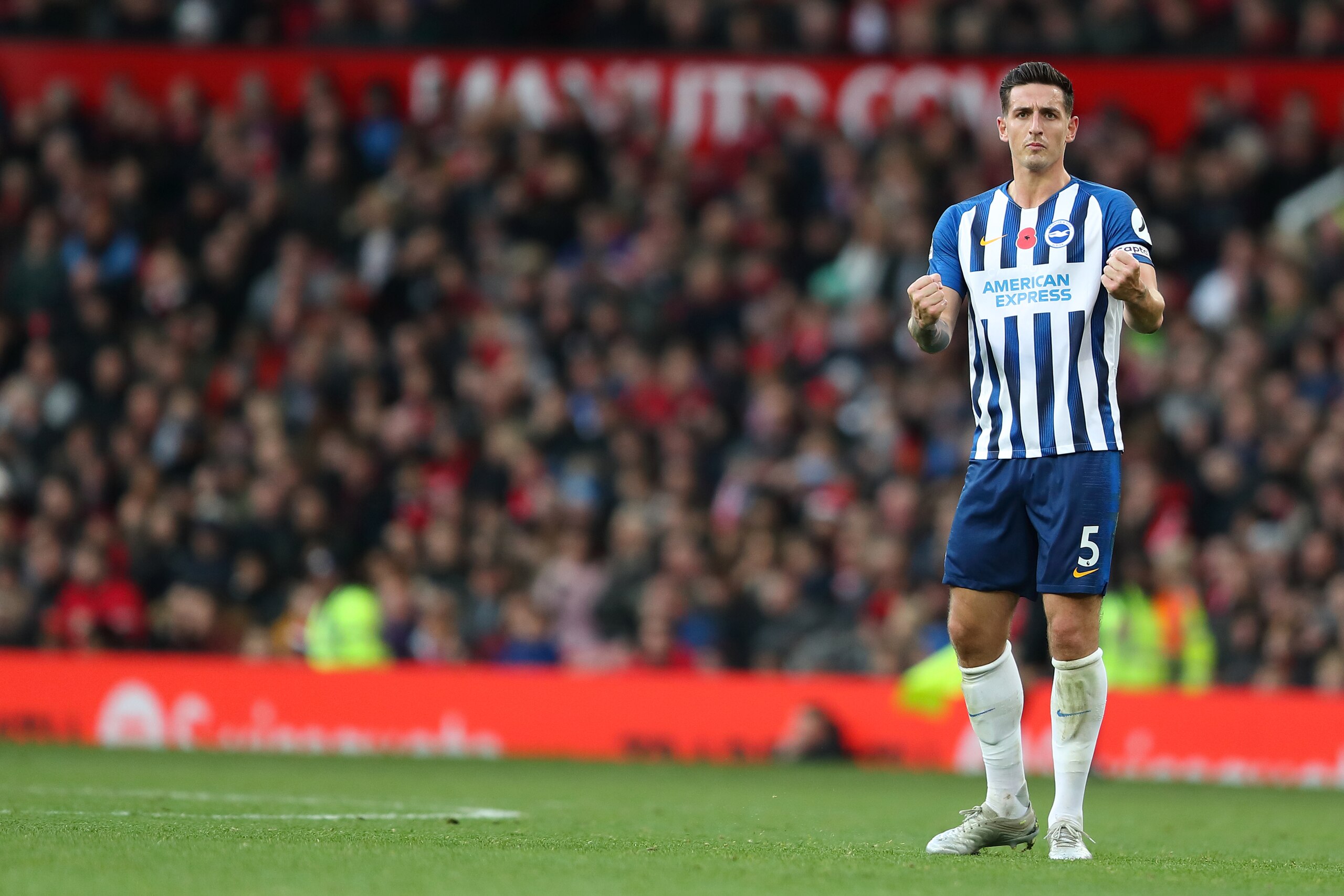 MANCHESTER, ENGLAND - NOVEMBER 10: Lewis Dunk of Brighton and Hove Albion celebrates after scoring a goal to make it 2-1 during the Premier League match between Manchester United and Brighton & Hove Albion at Old Trafford on November 10, 2019 in Mancheste MANCHESTER, ENGLAND - NOVEMBER 10: Lewis Dunk of Brighton and Hove Albion celebrates after scoring a goal to make it 2-1 during the Premier League match between Manchester United and Brighton & Hove Albion at Old Trafford on November 10, 2019 in Mancheste
