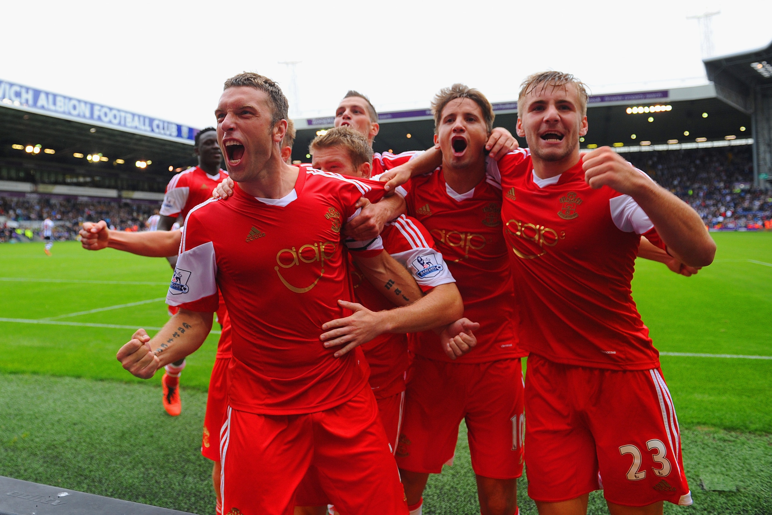 WEST BROMWICH, ENGLAND - AUGUST 17: Rickie Lambert of Southampton celebrates scoring the winning goal from a penalty with team matesduring the Barclays Premier League match between West Bromwich Albion and Southampton at The Hawthorns on August 17, 2013 WEST BROMWICH, ENGLAND - AUGUST 17: Rickie Lambert of Southampton celebrates scoring the winning goal from a penalty with team matesduring the Barclays Premier League match between West Bromwich Albion and Southampton at The Hawthorns on August 17, 2013