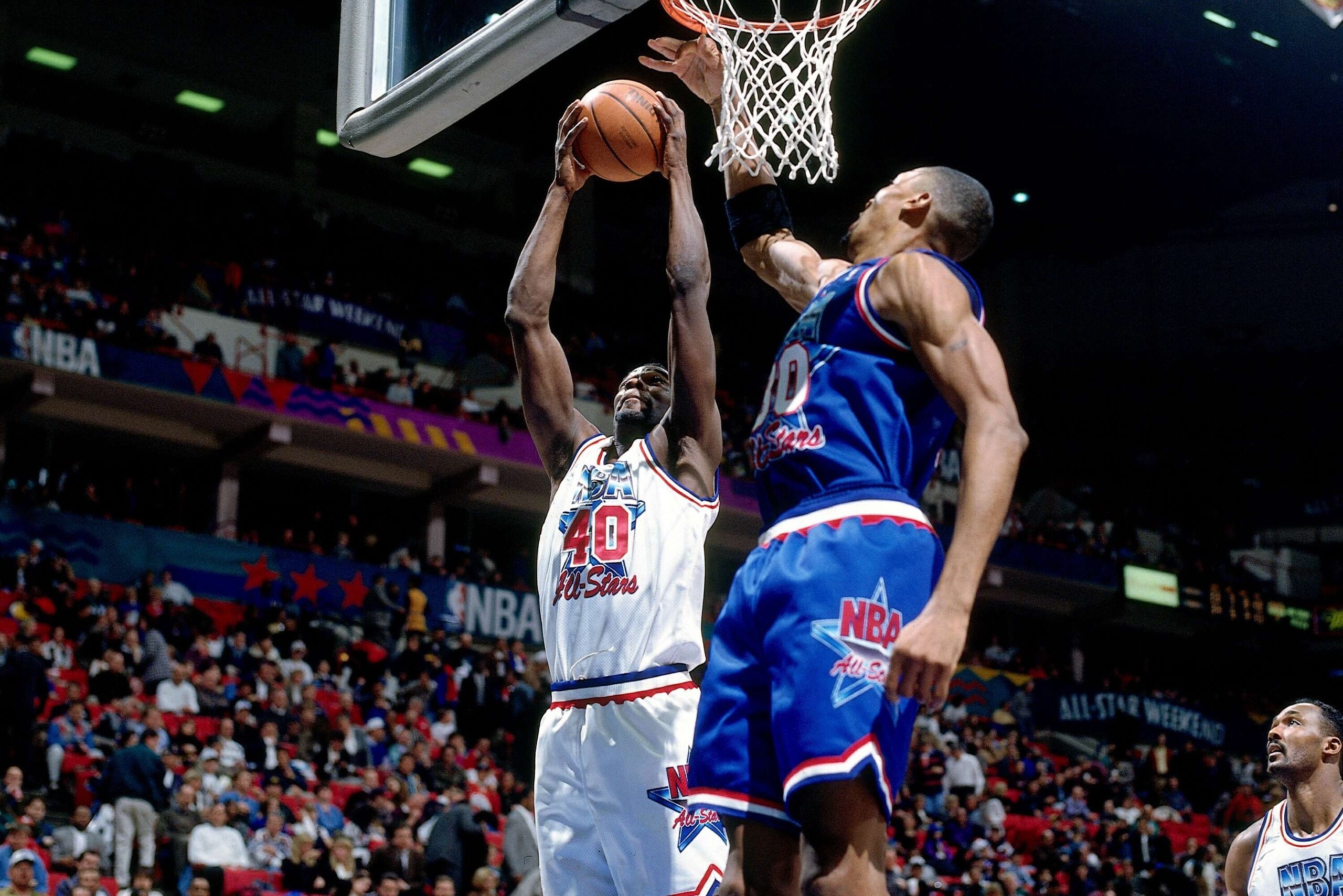 MINNEAPOLIS, MN - FEBRUARY 13: Shawn Kemp #40 of the Western Conference All Stars shoots a layup against Scottie Pippen #30 of the Eastern Conference All Stars during the 1994 NBA All Star Game played on February 13, 1994 at the Target Center in Minneapo MINNEAPOLIS, MN - FEBRUARY 13: Shawn Kemp #40 of the Western Conference All Stars shoots a layup against Scottie Pippen #30 of the Eastern Conference All Stars during the 1994 NBA All Star Game played on February 13, 1994 at the Target Center in Minneapo