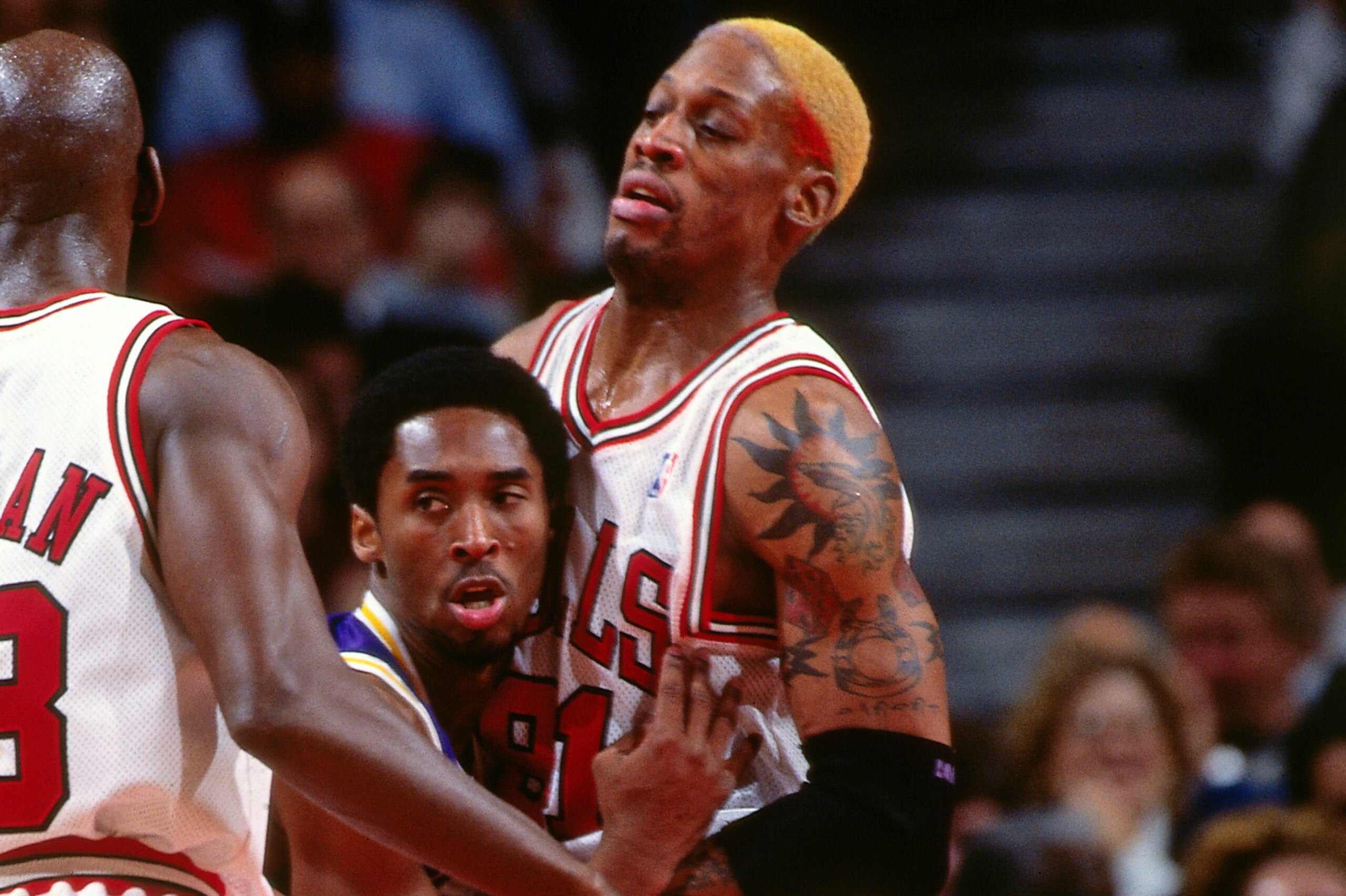 CHICAGO, IL - DECEMBER 17: Kobe Bryant #8 of the Los Angeles Lakers battles for position against Michael Jordan #23 and Dennis Rodman #91 of the Chicago Bulls on December 17, 1997 at Chicago Stadium in Chicago, IL NOTE TO USER: User expressly acknowledges CHICAGO, IL - DECEMBER 17: Kobe Bryant #8 of the Los Angeles Lakers battles for position against Michael Jordan #23 and Dennis Rodman #91 of the Chicago Bulls on December 17, 1997 at Chicago Stadium in Chicago, IL NOTE TO USER: User expressly acknowledges