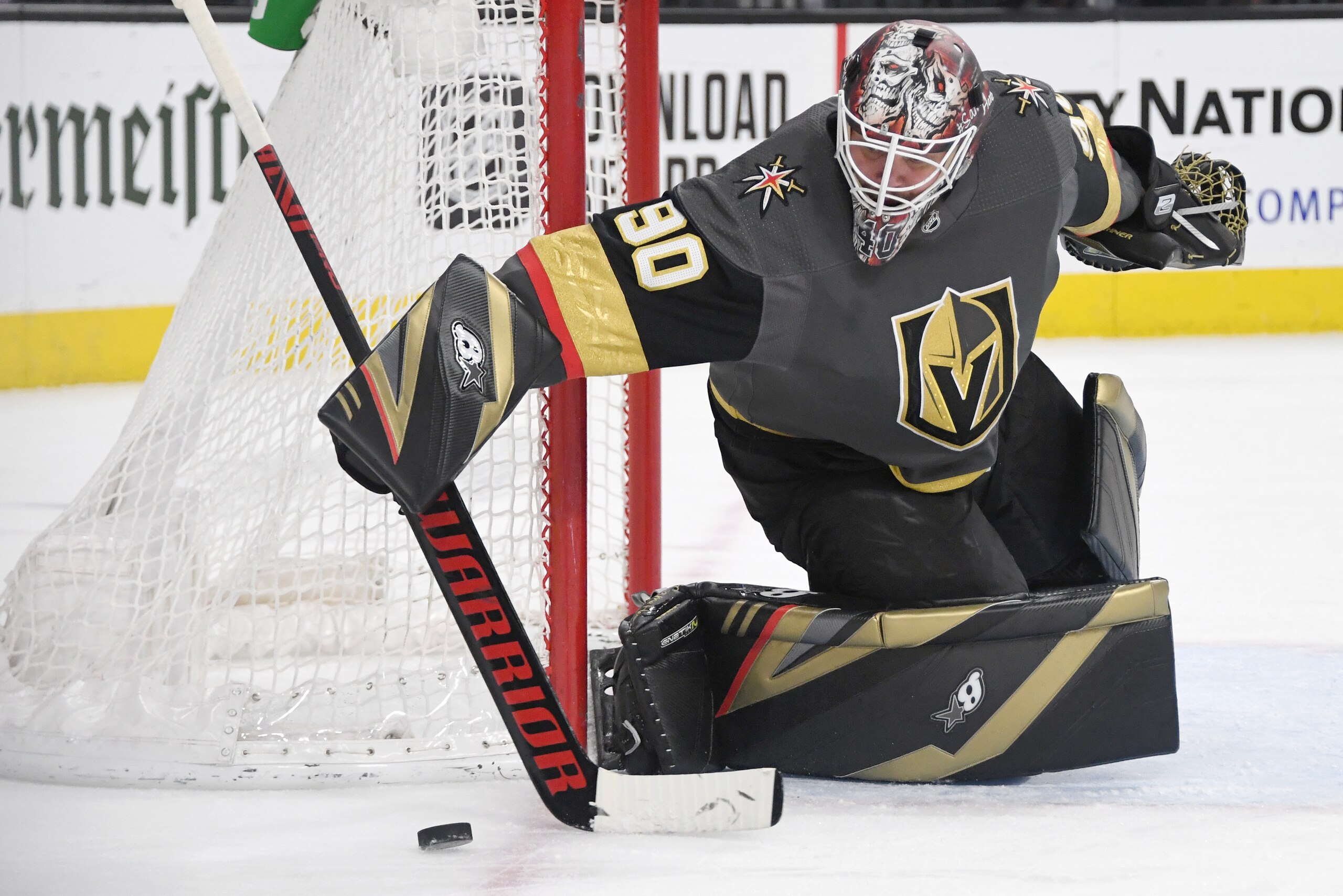 LAS VEGAS, NEVADA - MARCH 03:  Robin Lehner #90 of the Vegas Golden Knights pushes the puck past the net in the first period of a game against the New Jersey Devils at T-Mobile Arena on March 3, 2020 in Las Vegas, Nevada.  (Photo by Ethan Miller/Getty Ima