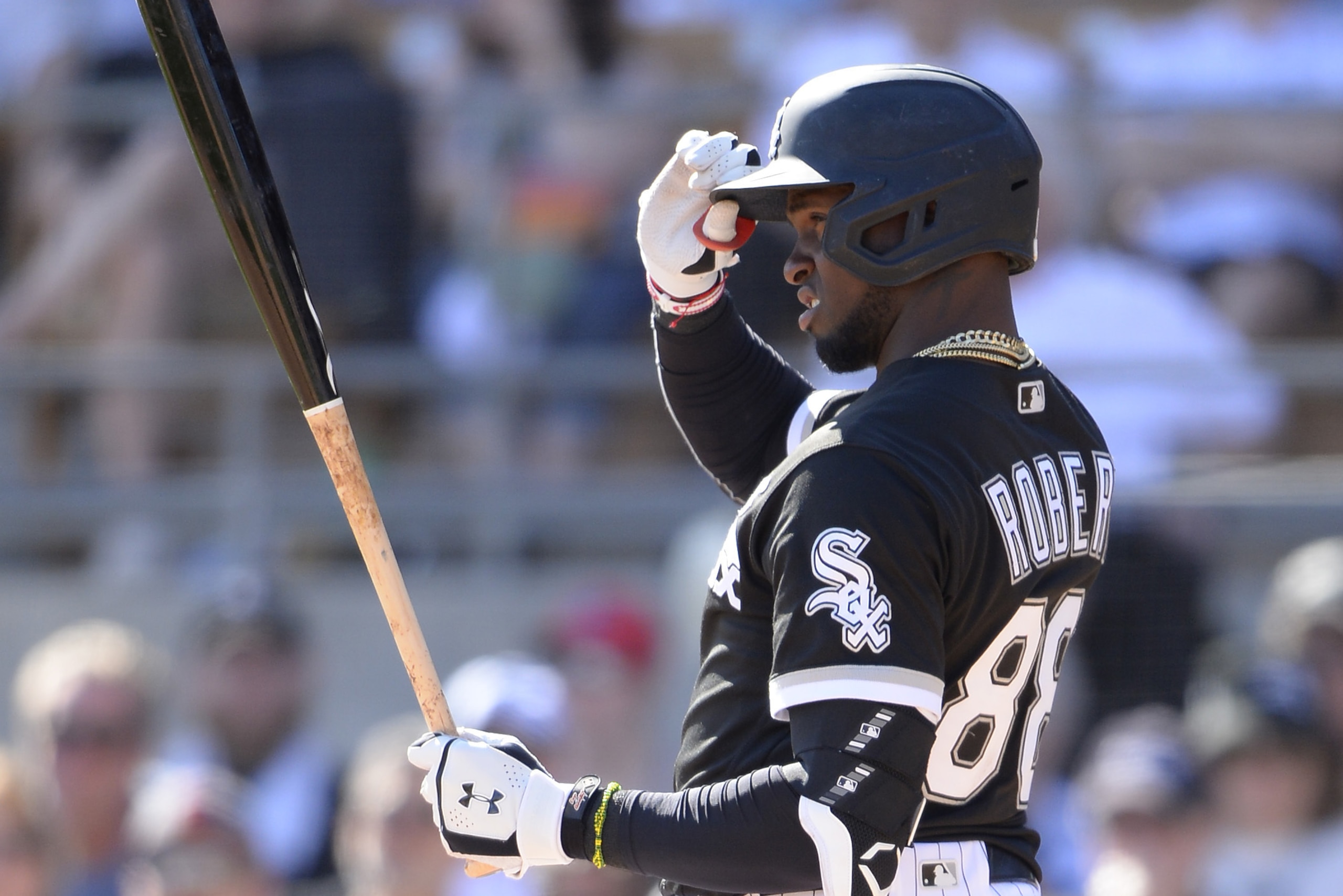 GLENDALE, ARIZONA - MARCH 08:  Luis Robert #88 of the Chicago White Sox looks on against the Kansas City Royals on March 8, 2020 at Camelback Ranch in Glendale Arizona.  (Photo by Ron Vesely/Getty Images)