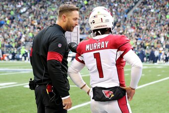 SEATTLE, WASHINGTON - DECEMBER 22: Head coach Kliff Kingsbury of the Arizona Cardinals and quarterback Kyler Murray #1 talk on the sidelines during the game against the Seattle Seahawks at CenturyLink Field on December 22, 2019 in Seattle, Washington. (Ph