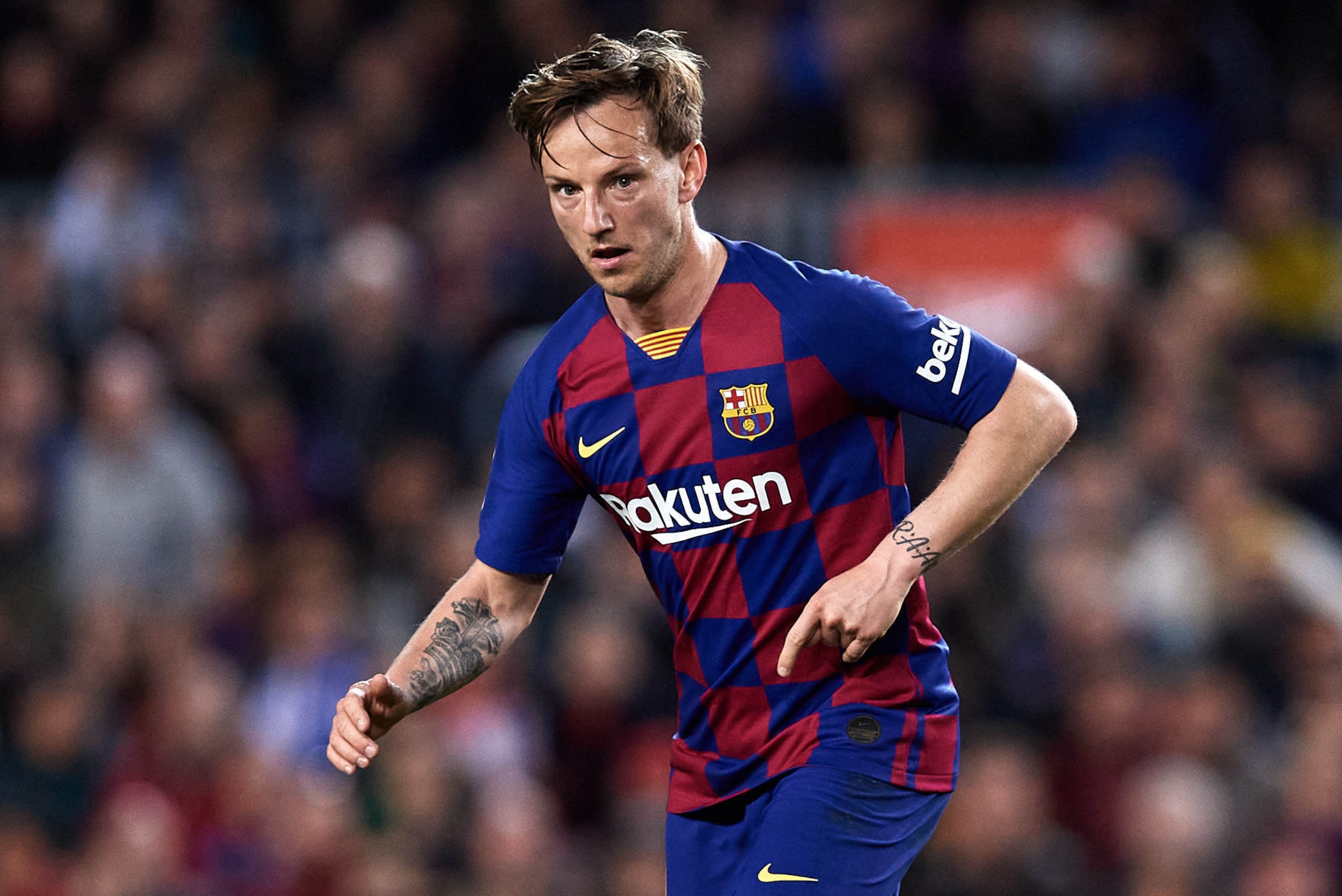 BARCELONA, SPAIN - MARCH 07: Ivan Rakitic of FC Barcelona conducts the ball during the Liga match between FC Barcelona and Real Sociedad at Camp Nou on March 07, 2020 in Barcelona, Spain. (Photo by Alex Caparros/Getty Images)