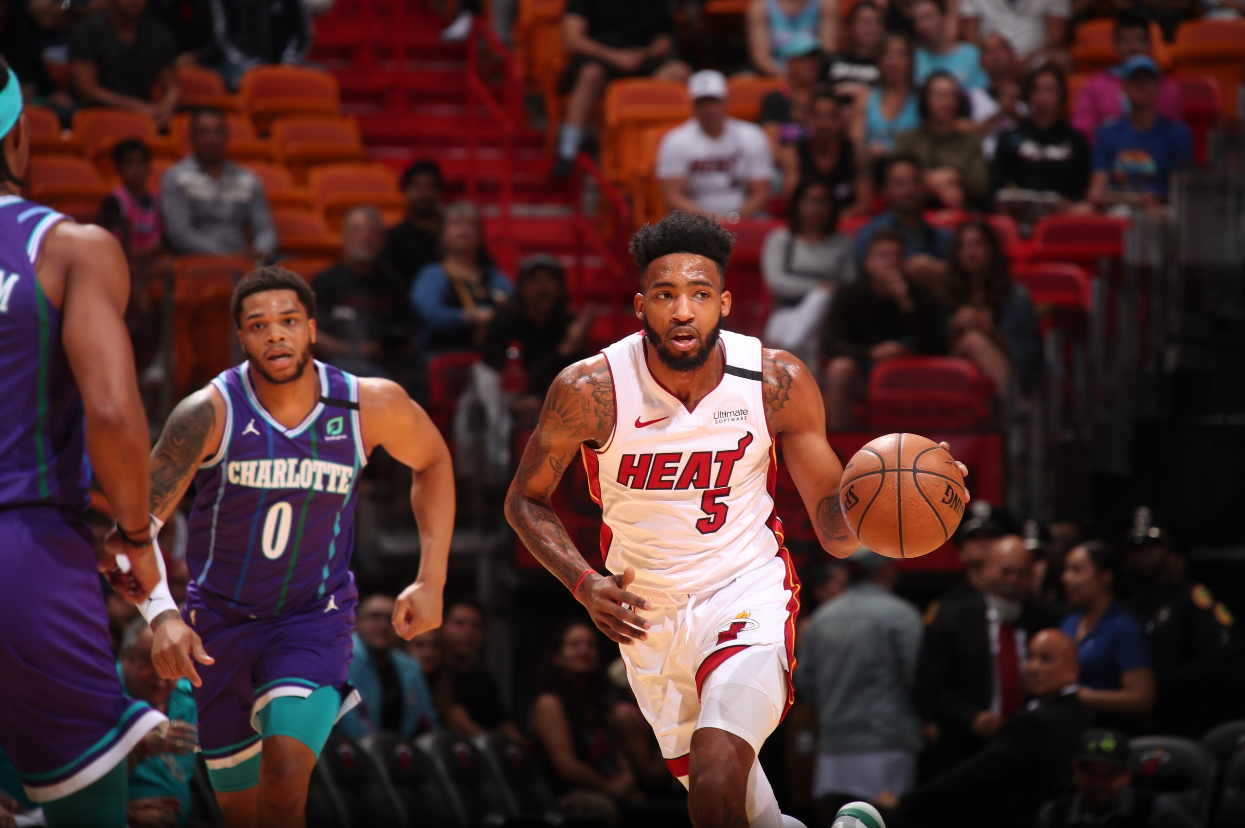 MIAMI, FL - MARCH 11: Derrick Jones Jr. #5 of the Miami Heat handles the ball against the Charlotte Hornets on March 11, 2020 at American Airlines Arena in Miami, Florida. NOTE TO USER: User expressly acknowledges and agrees that, by downloading and or u MIAMI, FL - MARCH 11: Derrick Jones Jr. #5 of the Miami Heat handles the ball against the Charlotte Hornets on March 11, 2020 at American Airlines Arena in Miami, Florida. NOTE TO USER: User expressly acknowledges and agrees that, by downloading and or u