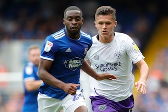 IPSWICH, ENGLAND - AUGUST 31: Kane Vincent-Young of Ipswich Town and Ryan Giles of Shrewsbury Town during the Sky Bet League One match between Ipswich Town and Shrewsbury Town at Portman Road on August 31, 2019 in Ipswich, England. (Photo by James Baylis 