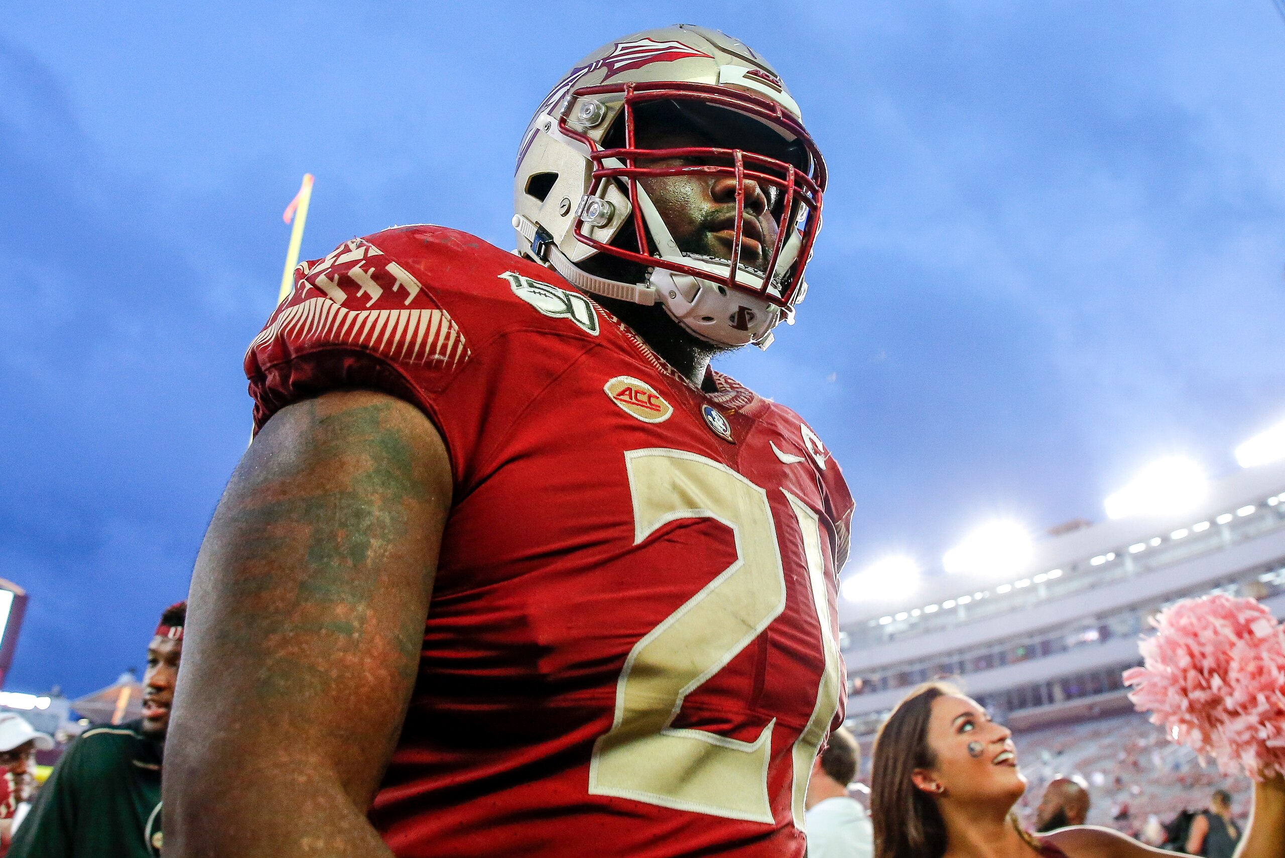 TALLAHASSEE, FL - OCTOBER 26: Defensive Tackle Marvin Wilson #21 of the Florida State Seminoles leaves the field after the game against the Syracuse Orange at Doak Campbell Stadium on Bobby Bowden Field on October 26, 2019 in Tallahassee, Florida. The Sem