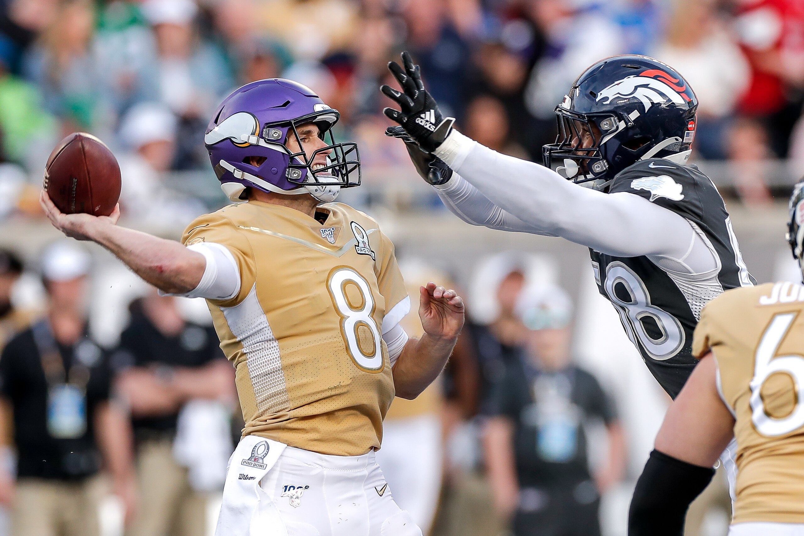 ORLANDO, FL - JANUARY 27: Quarterback Kirk Cousins #8 of the Minnesota Vikings from the NFC Team is being rushed by Linebacker Von Mills #58 of the Denver Broncos from the AFC Team during the NFL Pro Bowl Game at Camping World Stadium on January 26, 2020 ORLANDO, FL - JANUARY 27: Quarterback Kirk Cousins #8 of the Minnesota Vikings from the NFC Team is being rushed by Linebacker Von Mills #58 of the Denver Broncos from the AFC Team during the NFL Pro Bowl Game at Camping World Stadium on January 26, 2020