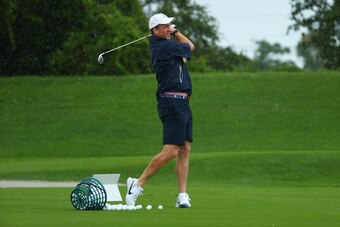 HOBE SOUND, FLORIDA - MAY 24: former NFL player Peyton Manning warms up on the range prior to The Match: Champions For Charity at Medalist Golf Club on May 24, 2020 in Hobe Sound, Florida. (Photo by Mike Ehrmann/Getty Images for The Match)