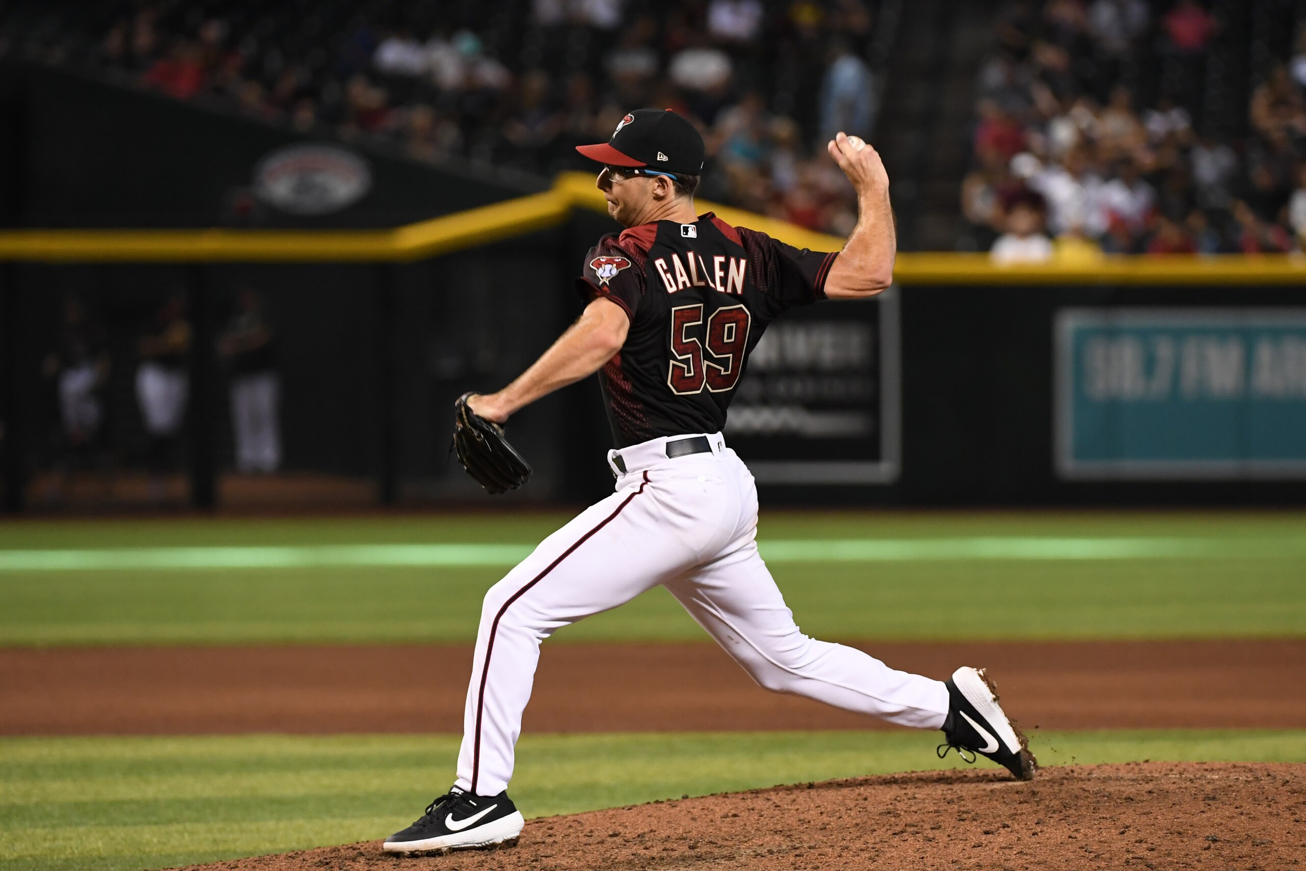 PHOENIX, ARIZONA - SEPTEMBER 15: Zac Gallen #59 of the Arizona Diamondbacks delivers a pitch against the Cincinnati Reds at Chase Field on September 15, 2019 in Phoenix, Arizona. (Photo by Norm Hall/Getty Images)