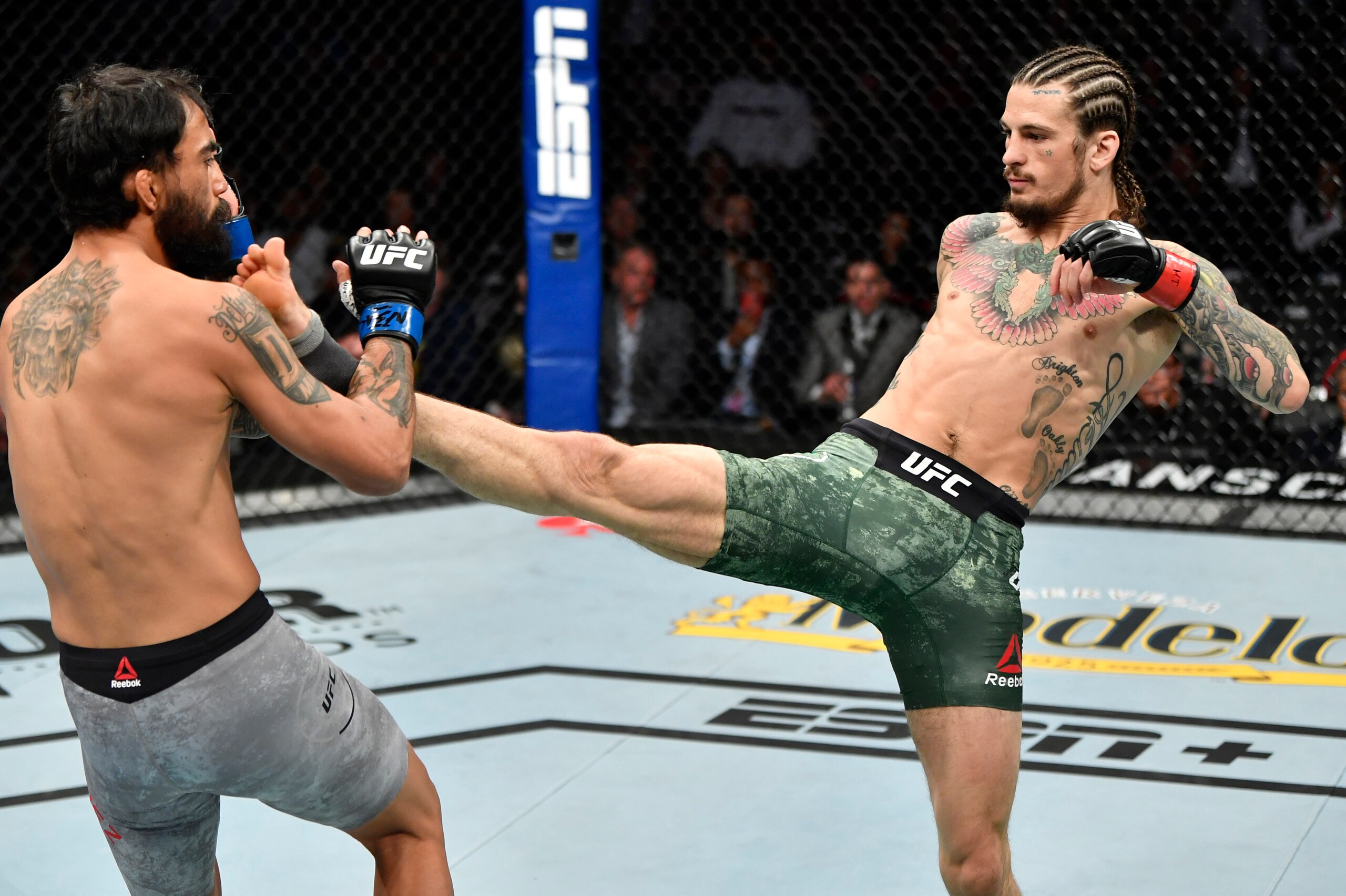 LAS VEGAS, NEVADA - MARCH 07: Sean O'Malley kicks Jose Quinonez in their bantamweight fight during the UFC 248 event at T-Mobile Arena on March 07, 2020 in Las Vegas, Nevada. (Photo by Jeff Bottari/Zuffa LLC)