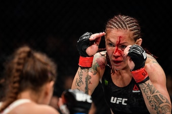 EDMONTON, ALBERTA - JULY 27:   (R-L) Cris Cyborg of Brazil battles Felicia Spencer of Canada in their featherweight bout during the UFC 240 event at Rogers Place on July 27, 2019 in Edmonton, Alberta, Canada. (Photo by Jeff Bottari/Zuffa LLC/Zuffa LLC)