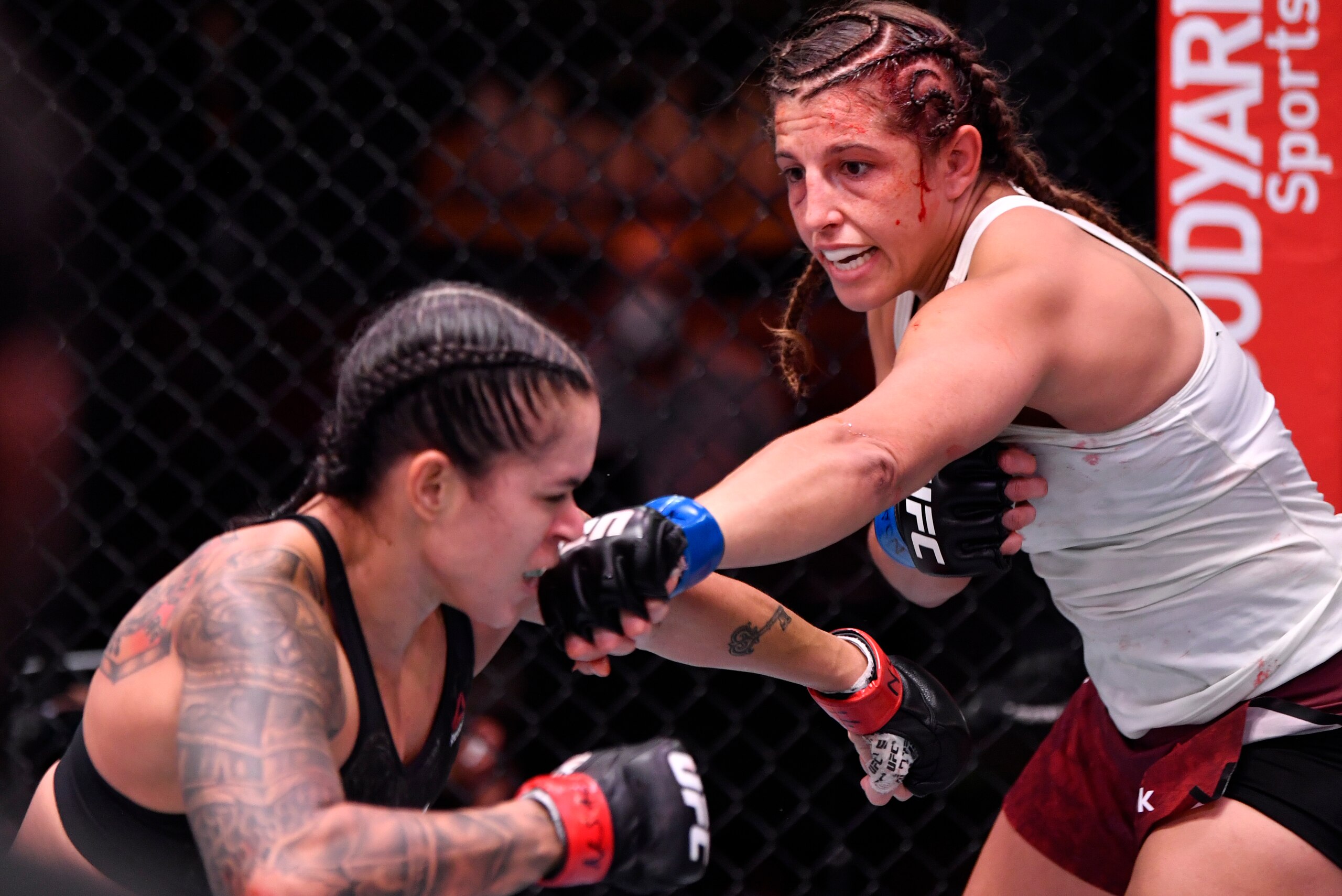 LAS VEGAS, NEVADA - JUNE 06: (R-L) Felicia Spencer of Canada punches Amanda Nunes of Brazil in their UFC featherweight championship bout during the UFC 250 event at UFC APEX on June 06, 2020 in Las Vegas, Nevada. (Photo by Jeff Bottari/Zuffa LLC)